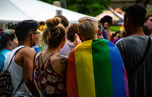 LGBT entrepreneurs standing together in a pride parade