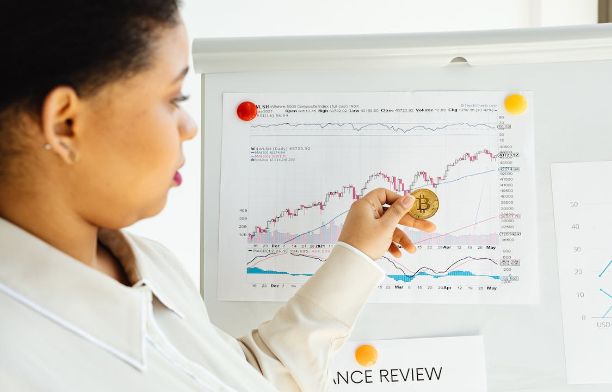 woman monitoring her growing investments