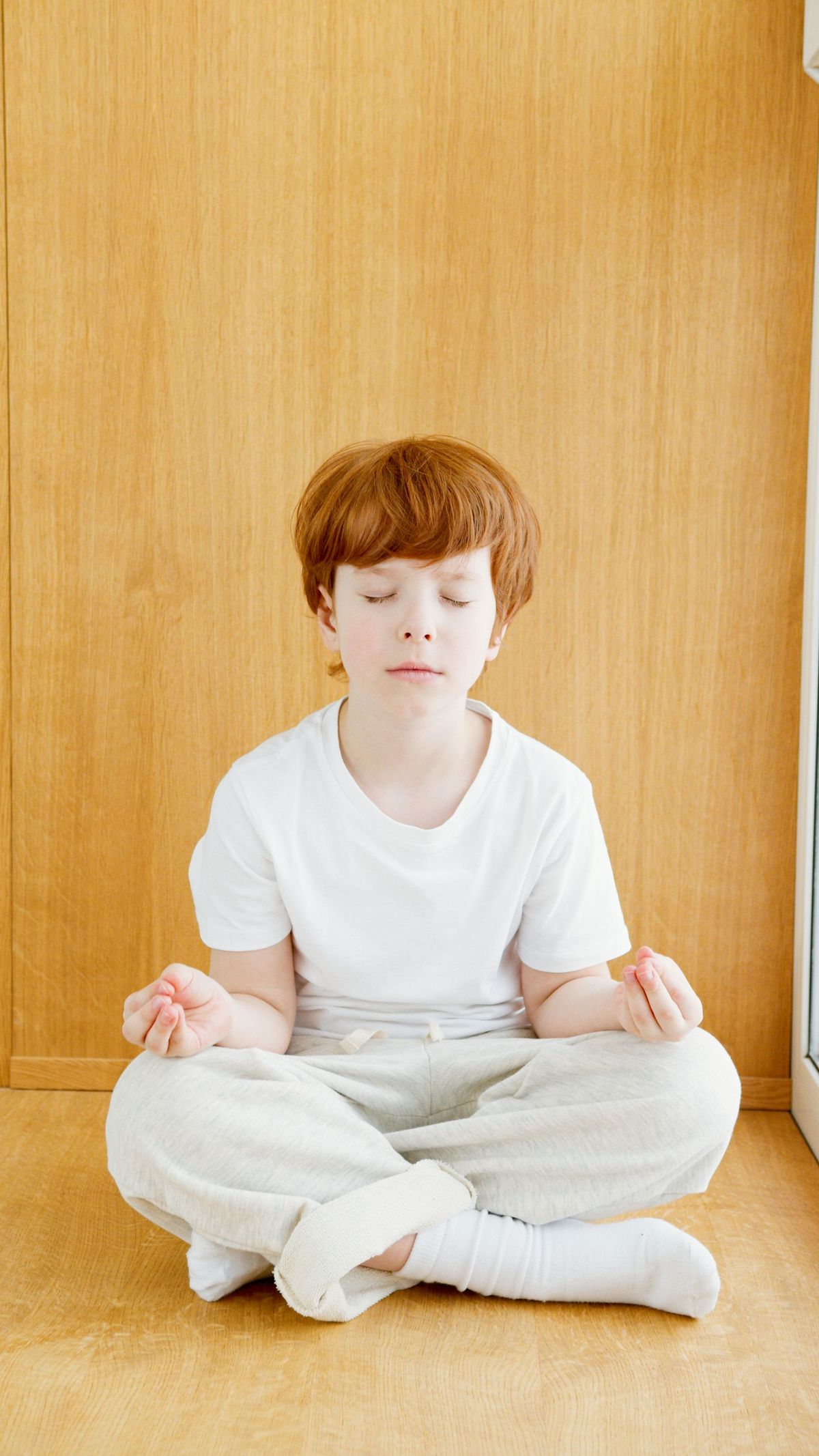 Psychomotricien accompagnant un enfant lors d'une séance