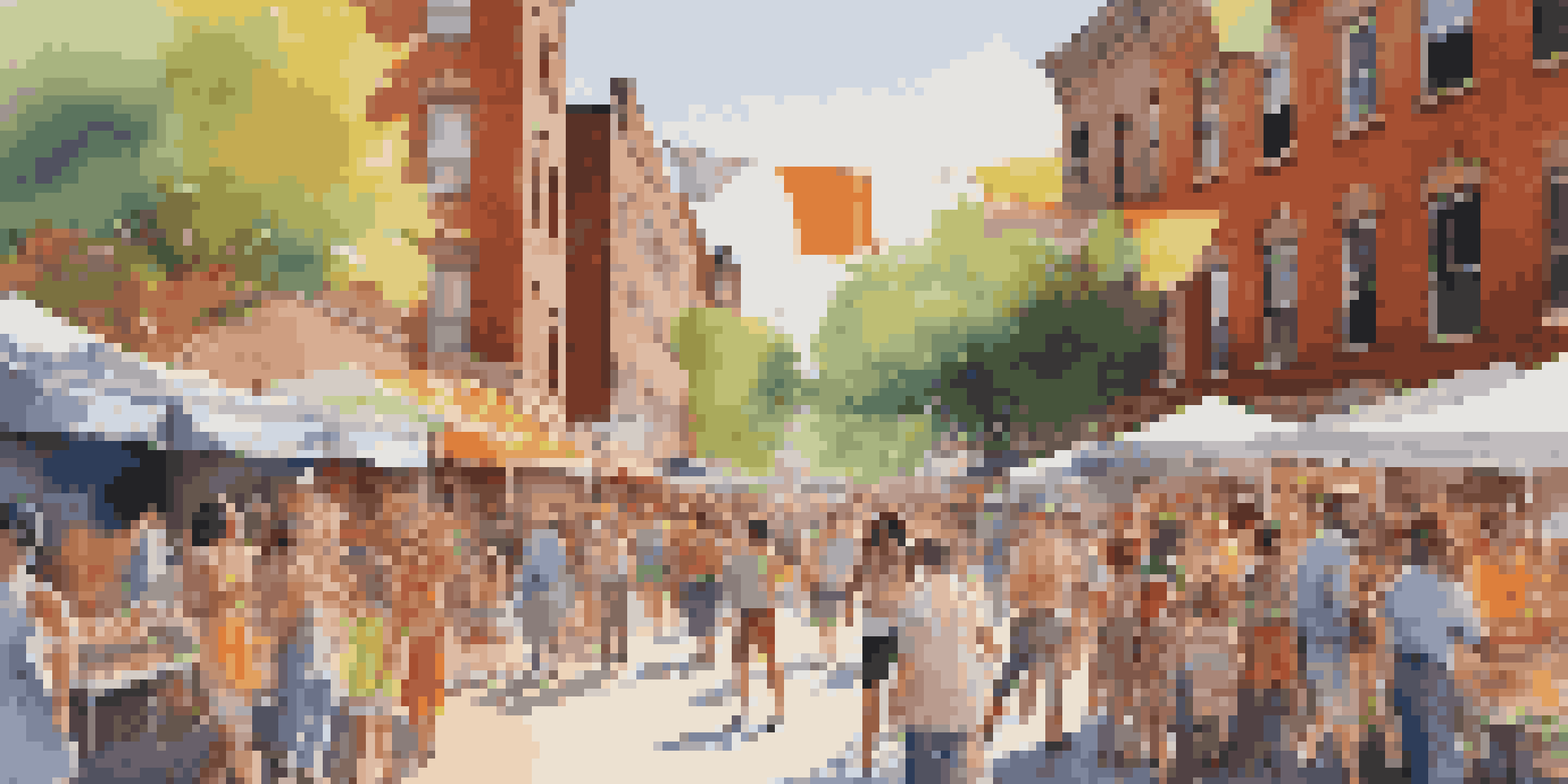 A bustling street scene with colorful murals and artists at work during an art festival, surrounded by a lively crowd and vibrant food stalls.