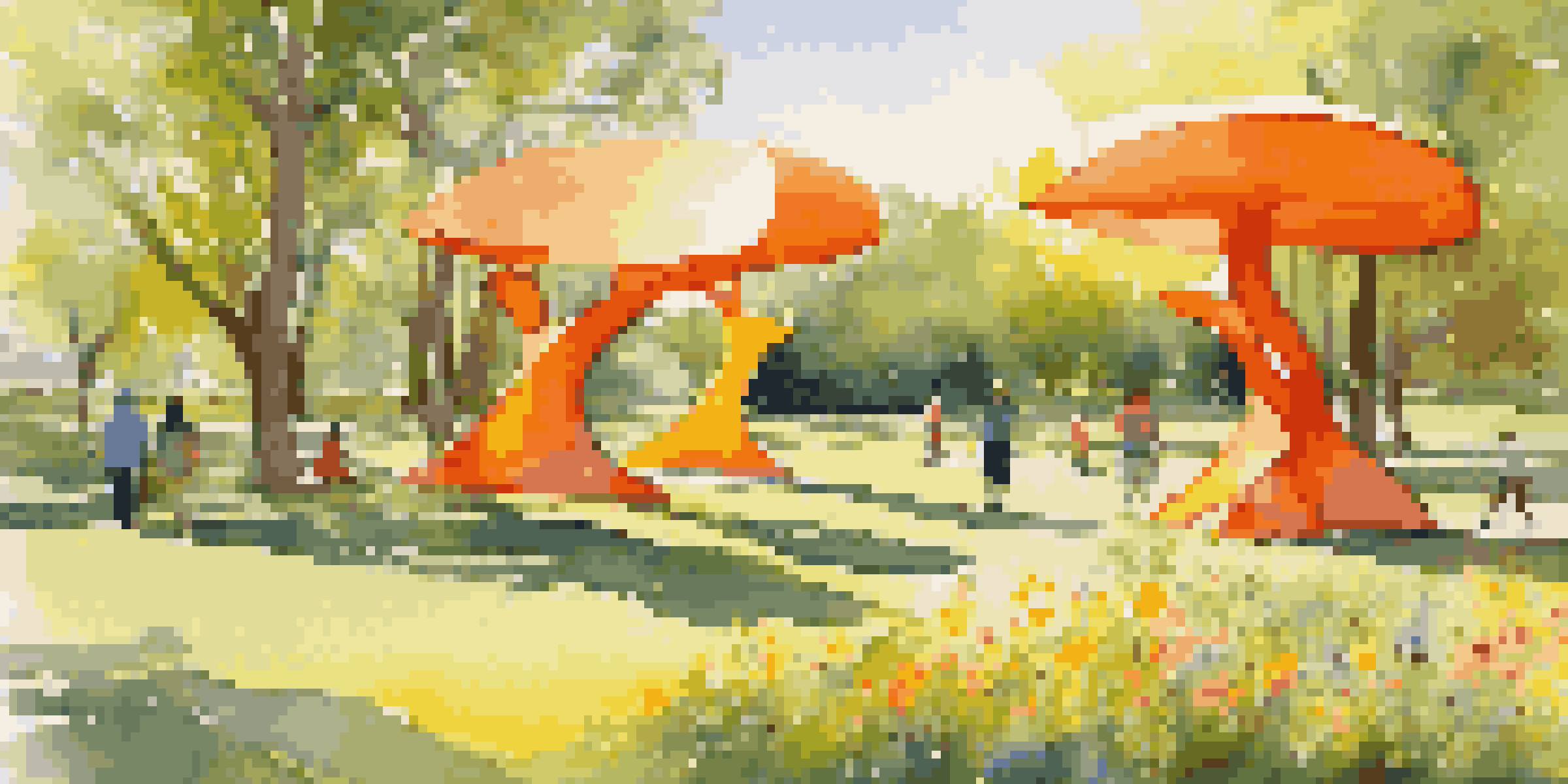 A sunny park with large, colorful abstract sculptures in orange and yellow surrounded by green grass and wildflowers.