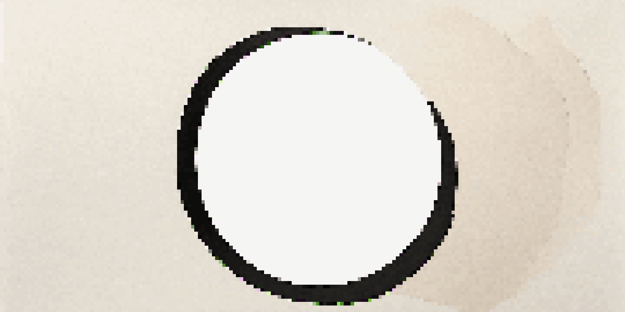 A large white canvas with a bold black circle off-center, softly lit with visible canvas texture.