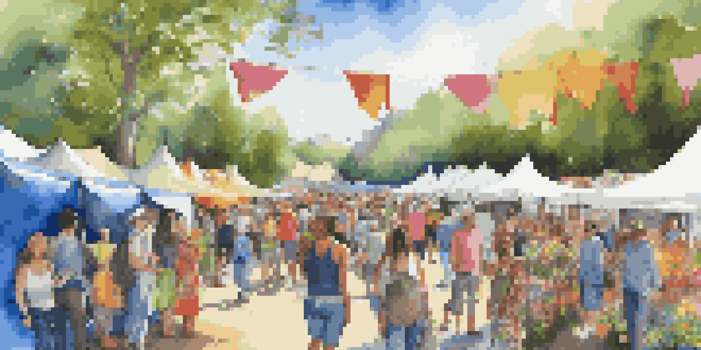 An outdoor art festival with colorful tents, diverse artists, and a crowd engaging with various artworks under a bright sky.