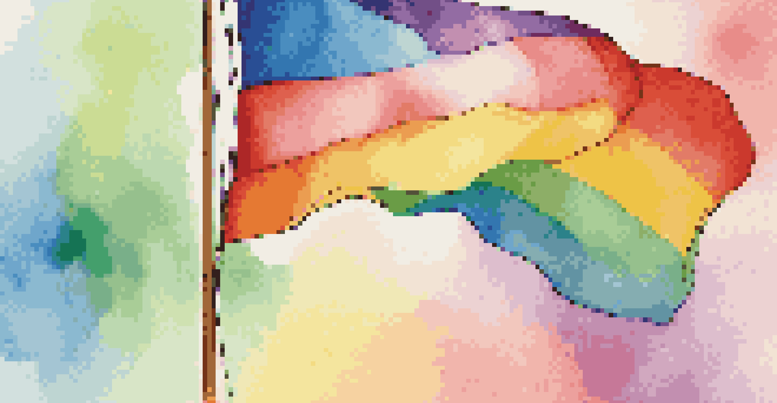 A close-up of a rainbow flag with vibrant colors waving in the wind against a soft bokeh background.