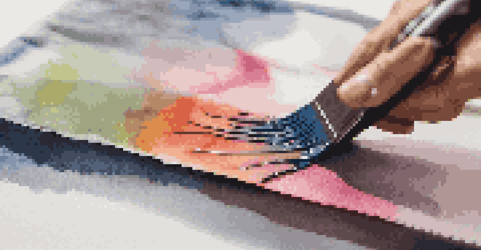 A close-up of a hand using a squeegee to apply vibrant ink onto a mesh screen with fabric below.