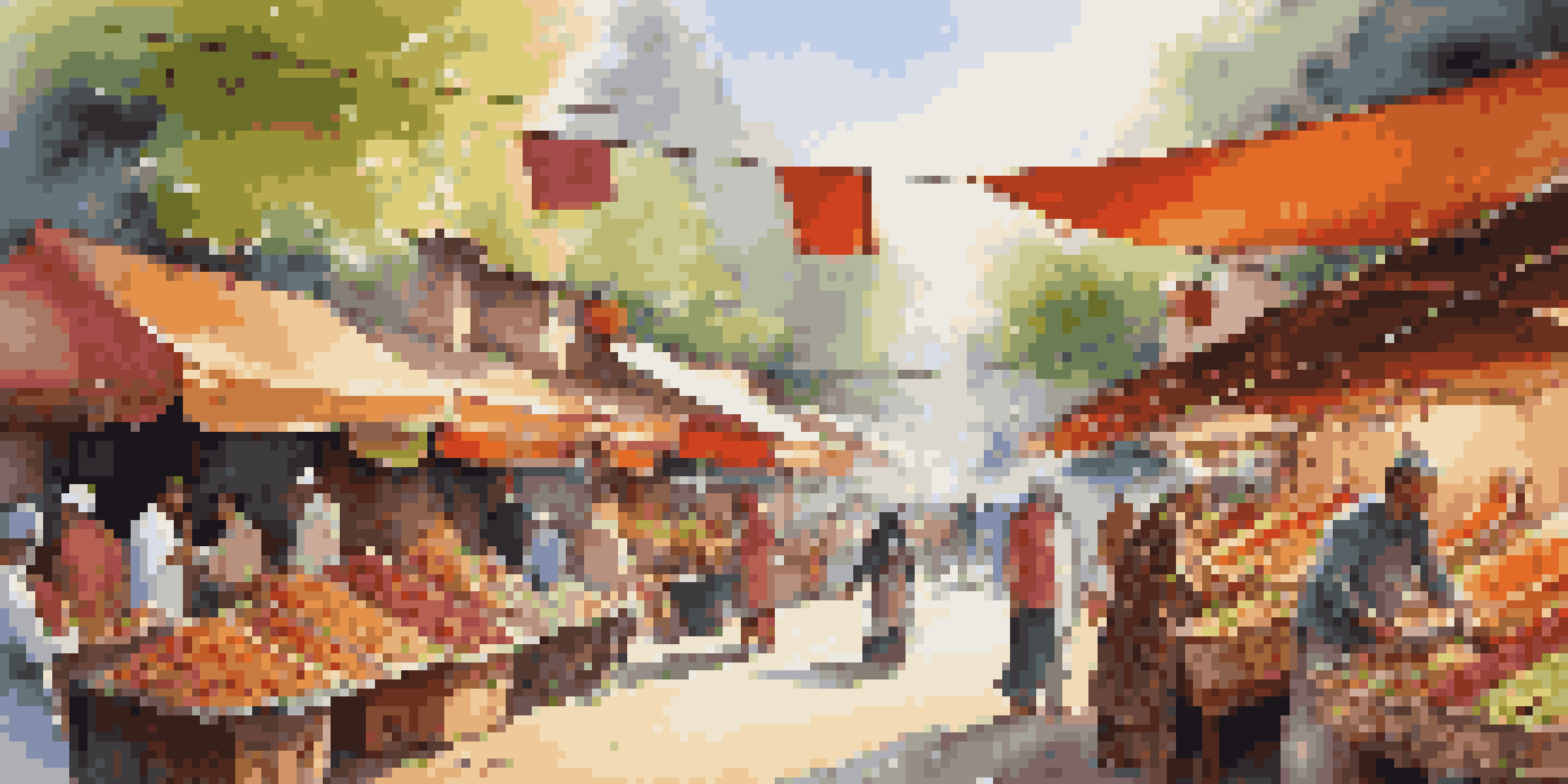 A lively street market filled with colorful stalls and diverse people, showcasing traditional crafts and foods.