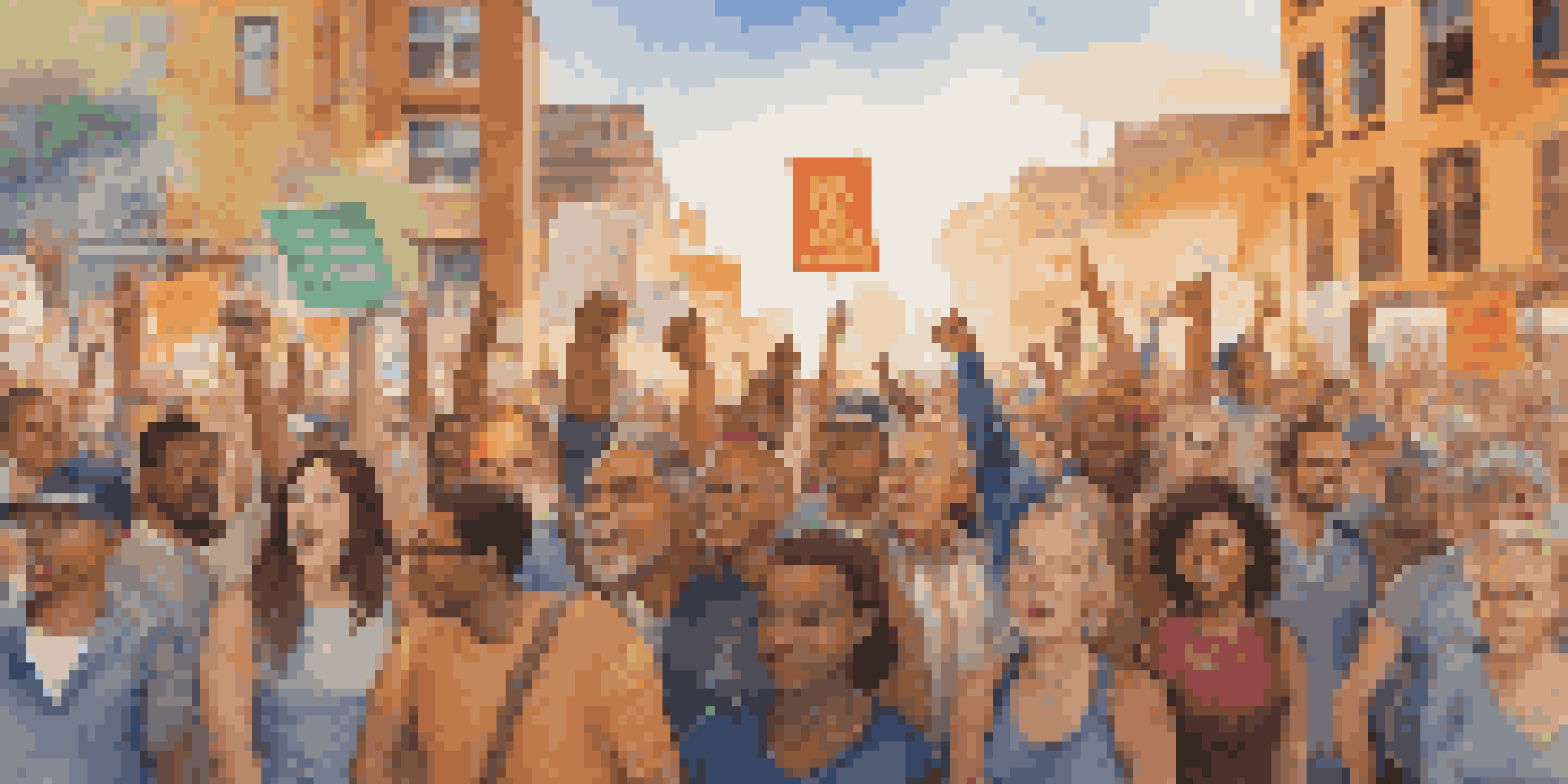A lively political rally with a diverse crowd holding colorful protest signs in front of a mural depicting hope and change, illuminated by warm golden hour light.