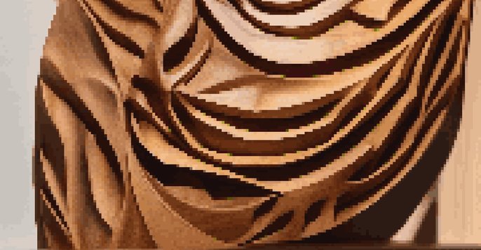 A detailed view of a wooden sculpture highlighting its grain patterns and warm colors in a softly lit gallery.