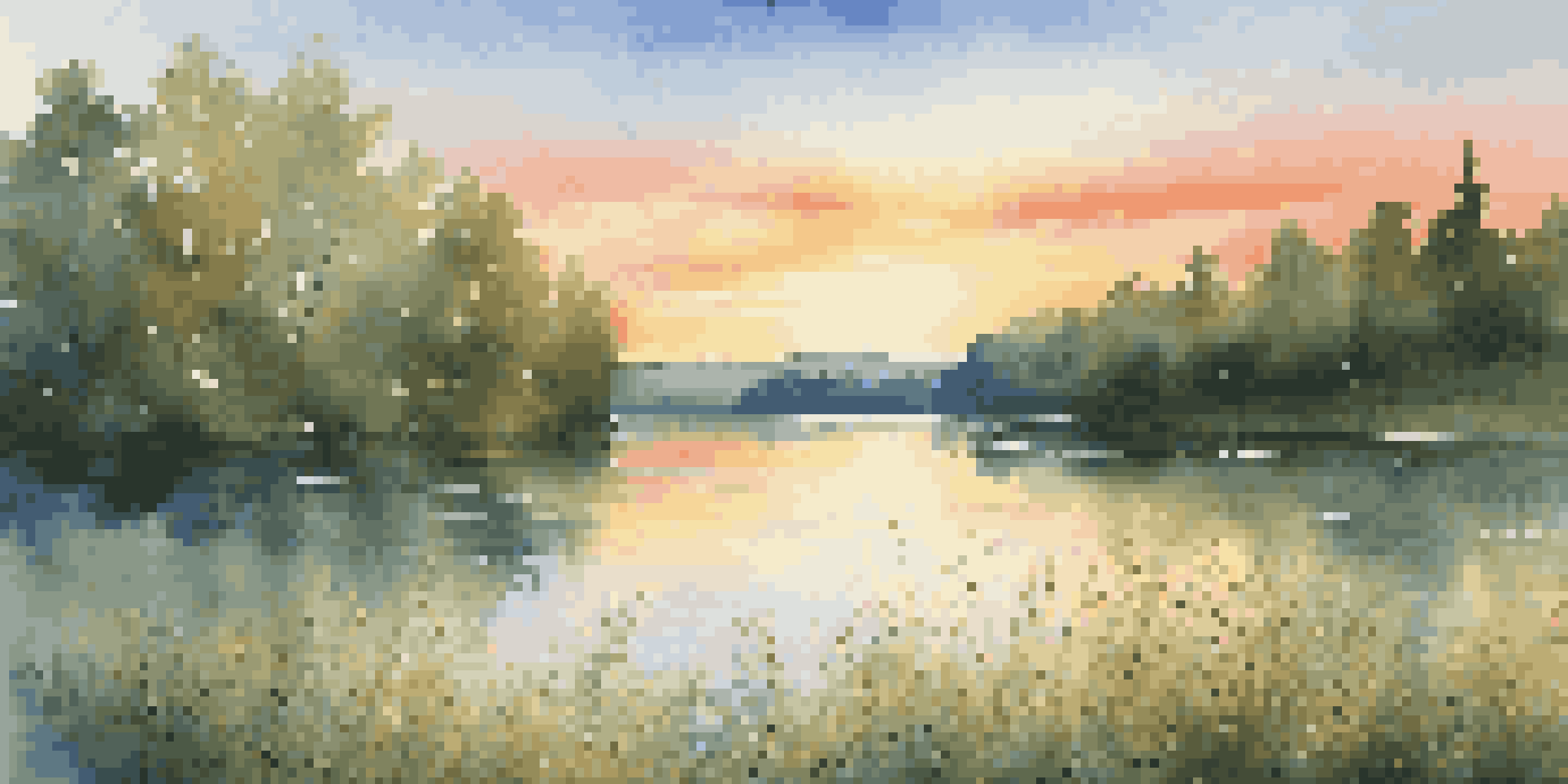 A peaceful lake at sunset, surrounded by green forests and blooming wildflowers, with reflections of the sunset in the water.