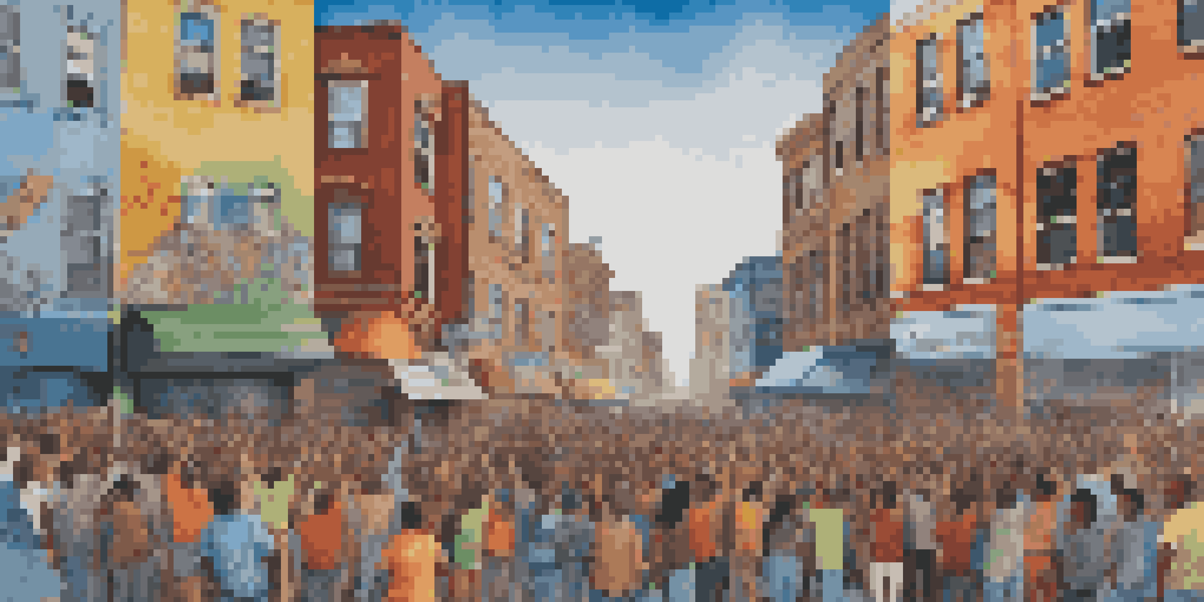 A colorful street mural showing a diverse group of people peacefully protesting for justice and equality, with graffiti art in the background.