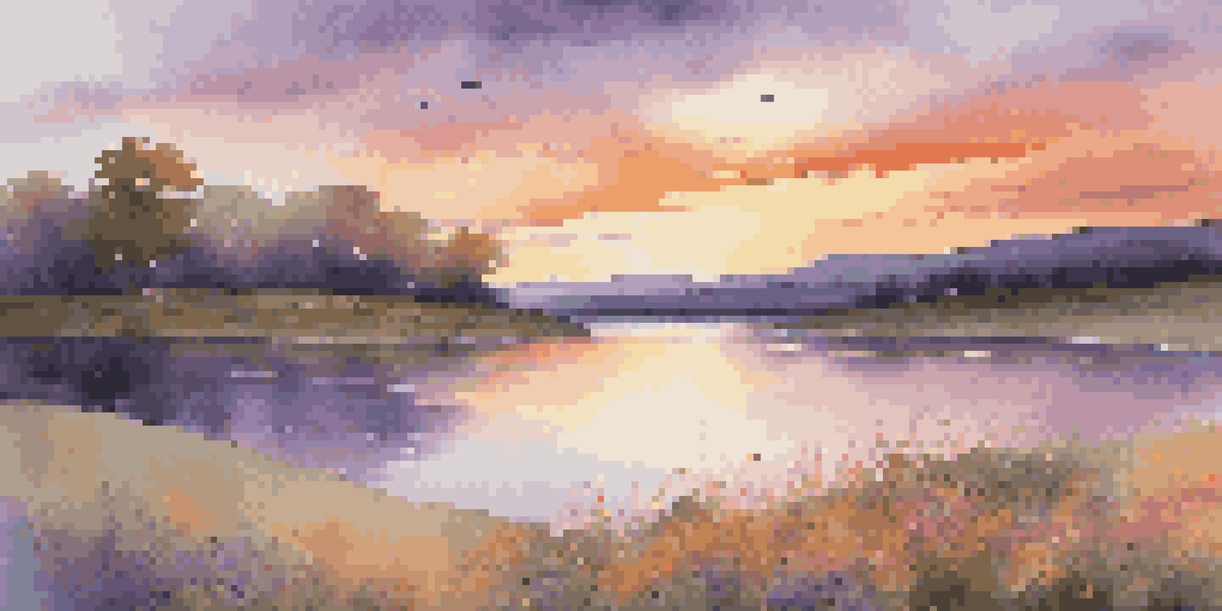 A peaceful sunset over a lake, with colorful reflections and wildflowers in the foreground.