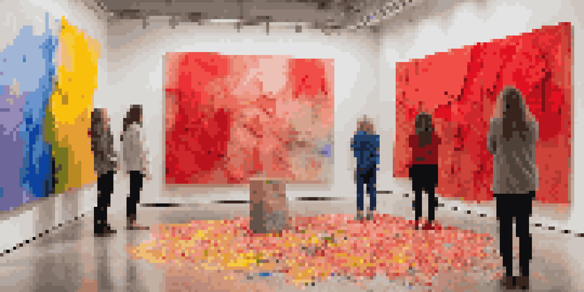 An art installation showcasing a large, colorful canvas and sculptures representing resilience, with people observing the artwork.