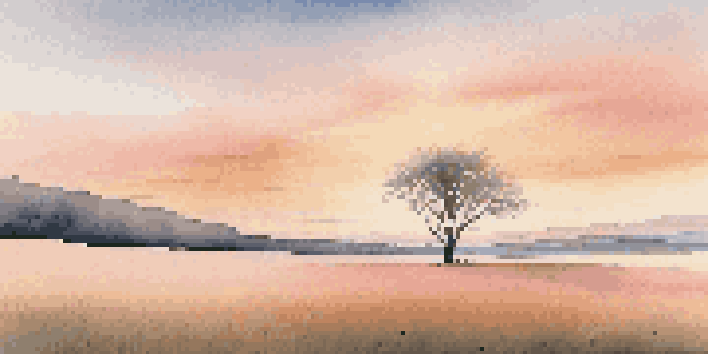 A lonely tree stands in the middle of a vast field at sunset, surrounded by soft pastel colors in the sky.