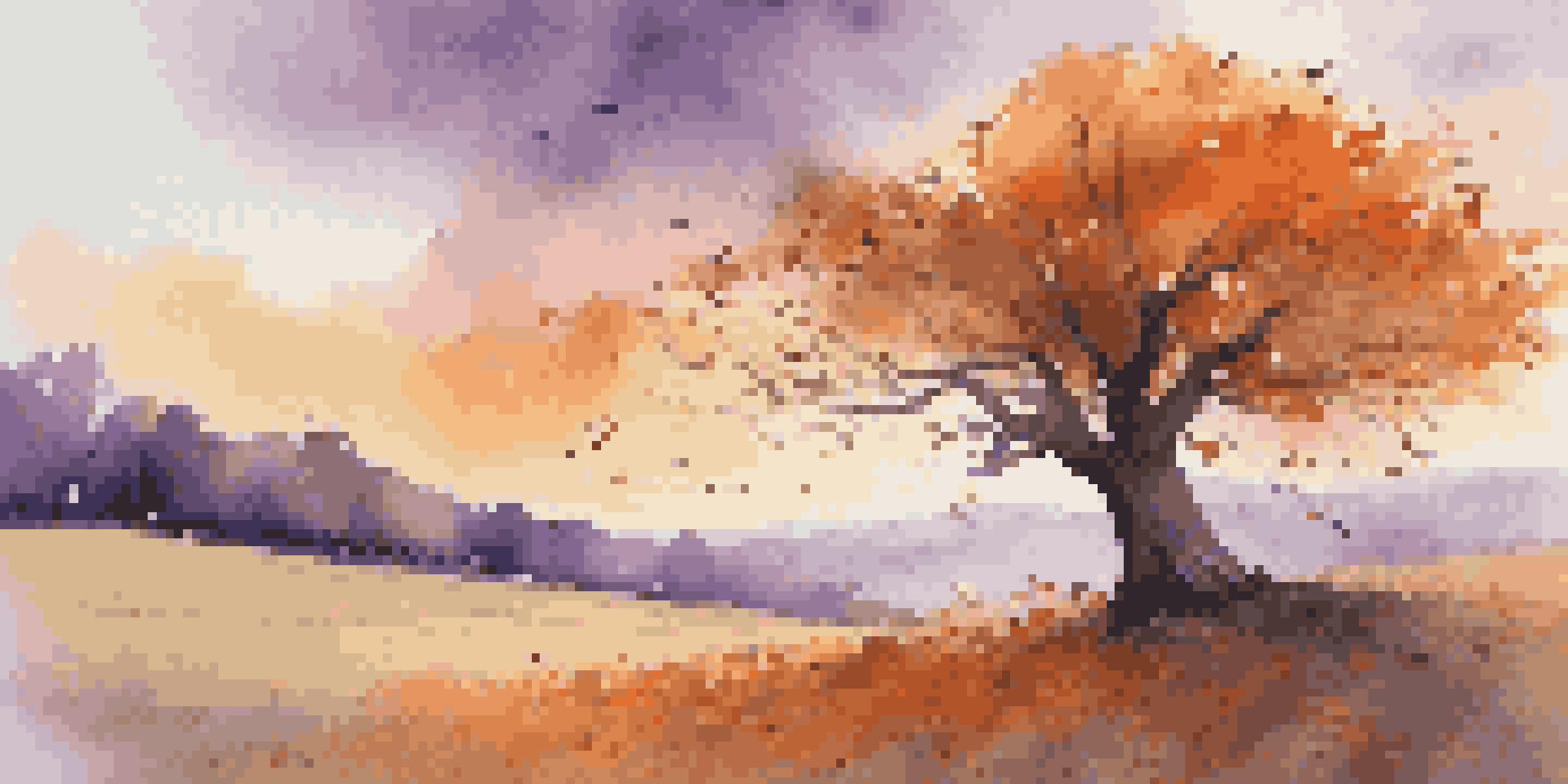 A large tree bending in the wind with colorful autumn leaves, set against a sunset sky with warm colors.