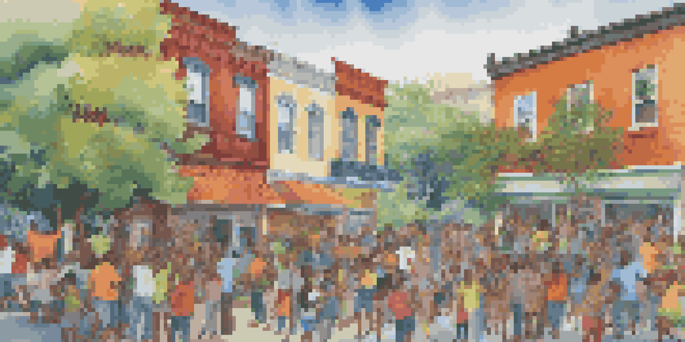 A colorful mural being painted by a diverse group of people, showcasing collaboration and community engagement.