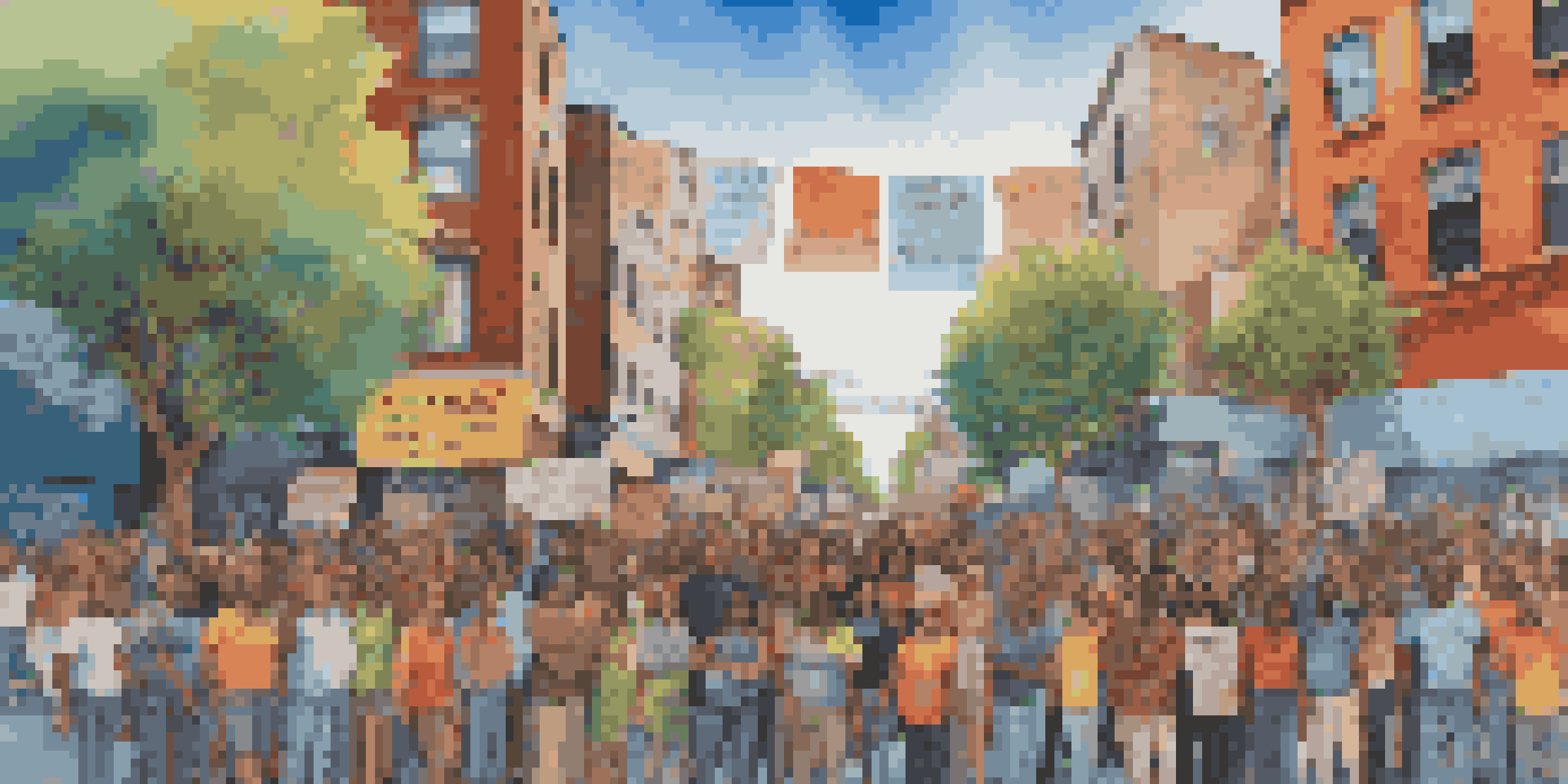 A mural showing a diverse group of activists with banners advocating for social justice in a colorful urban environment.