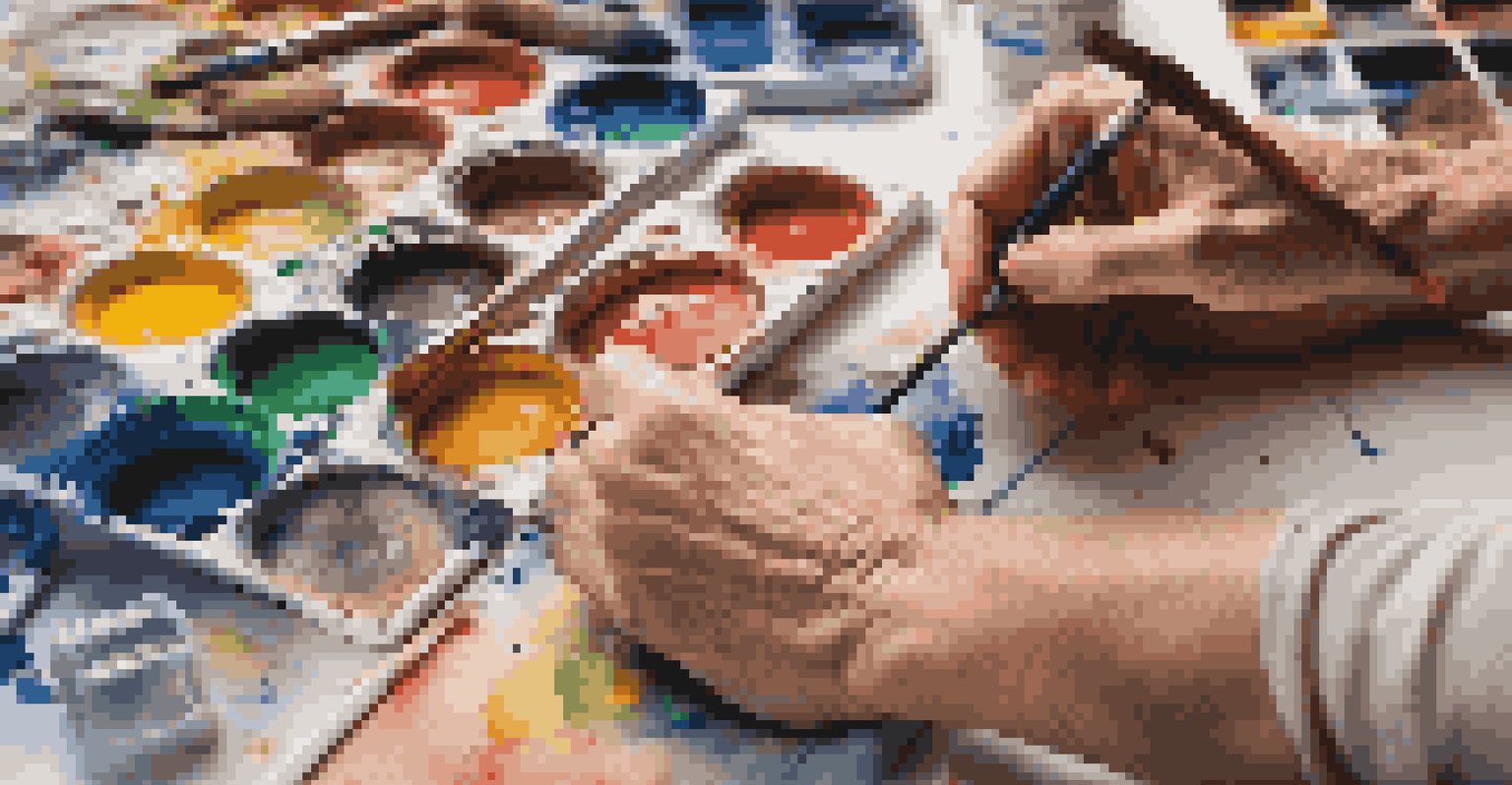 An artist's hands painting a colorful mural with art supplies scattered around in a studio, illuminated by soft lighting.