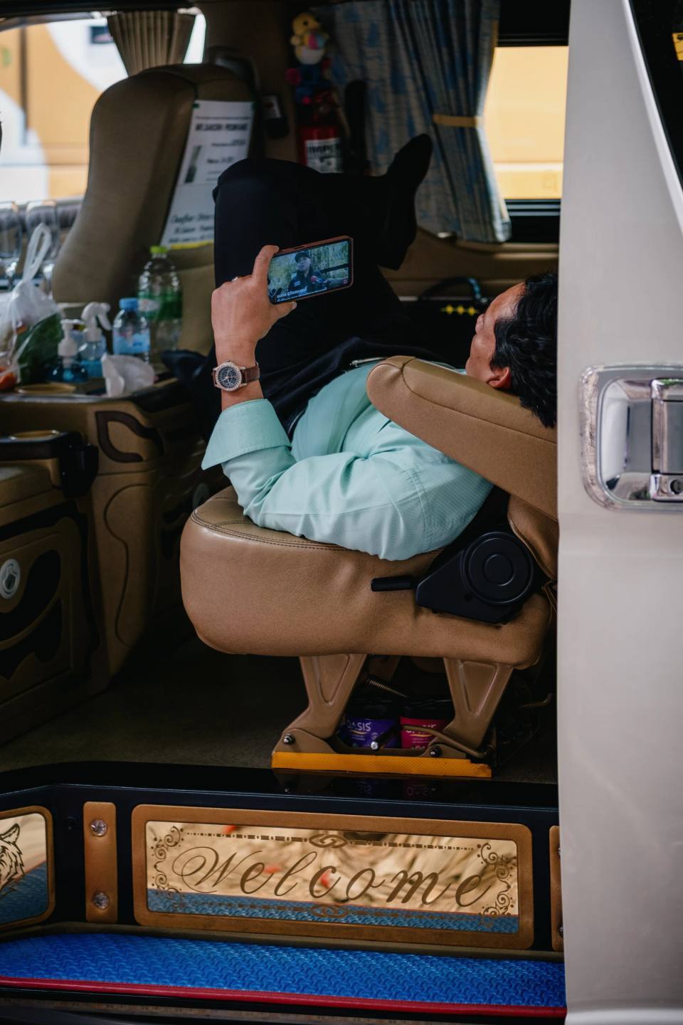 Passengers seated inside a local vehicle.