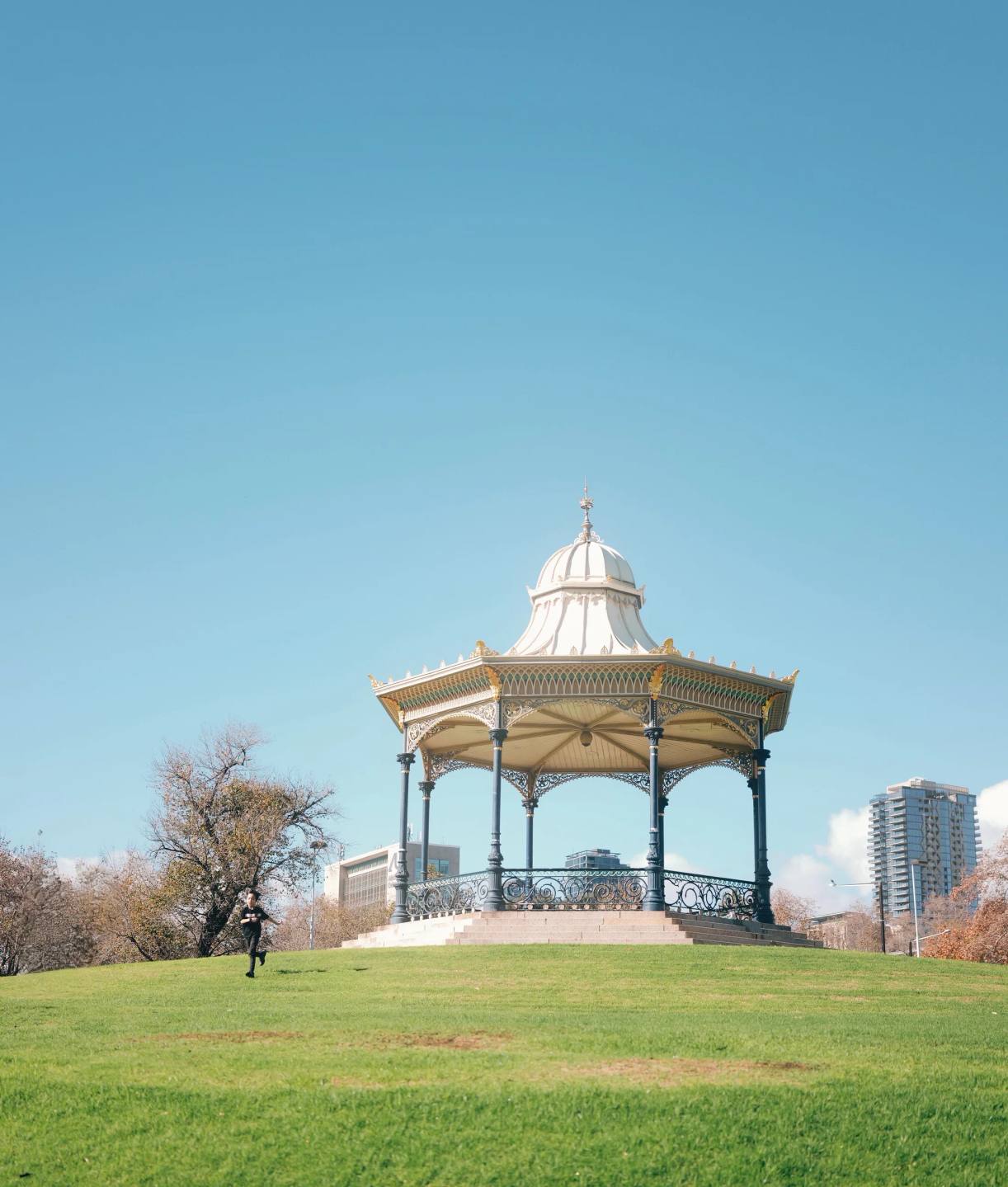 A bandstand under a clear blue sky.