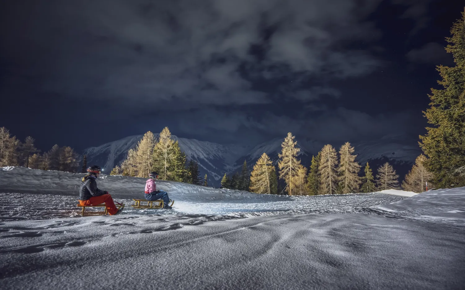 Nachtschlitteln am Rinerhorn für Familien im Winter