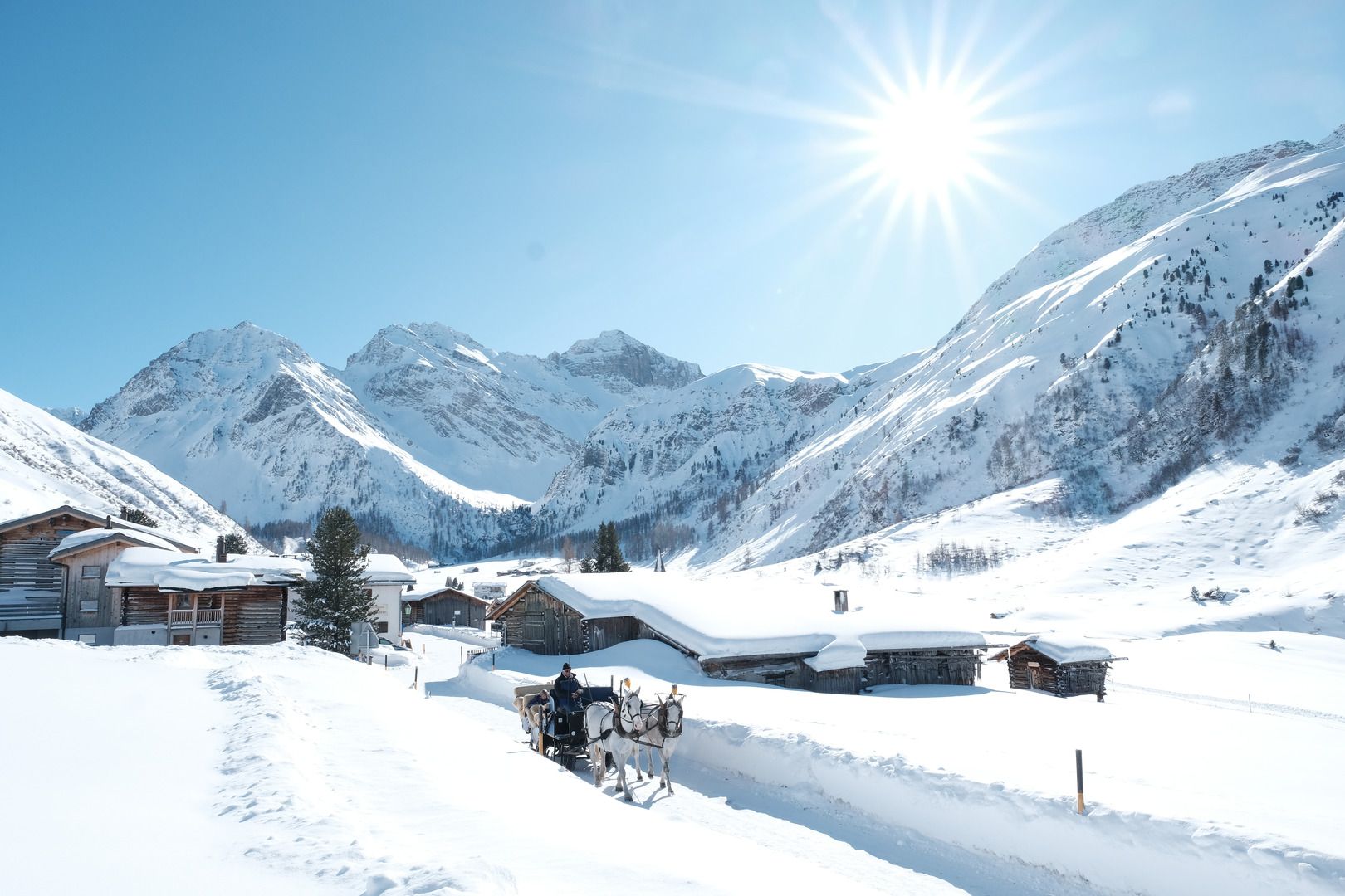 Kutschenfahrt durch Sertig, Davos bei Sonnenschein (c) Marcel Giger