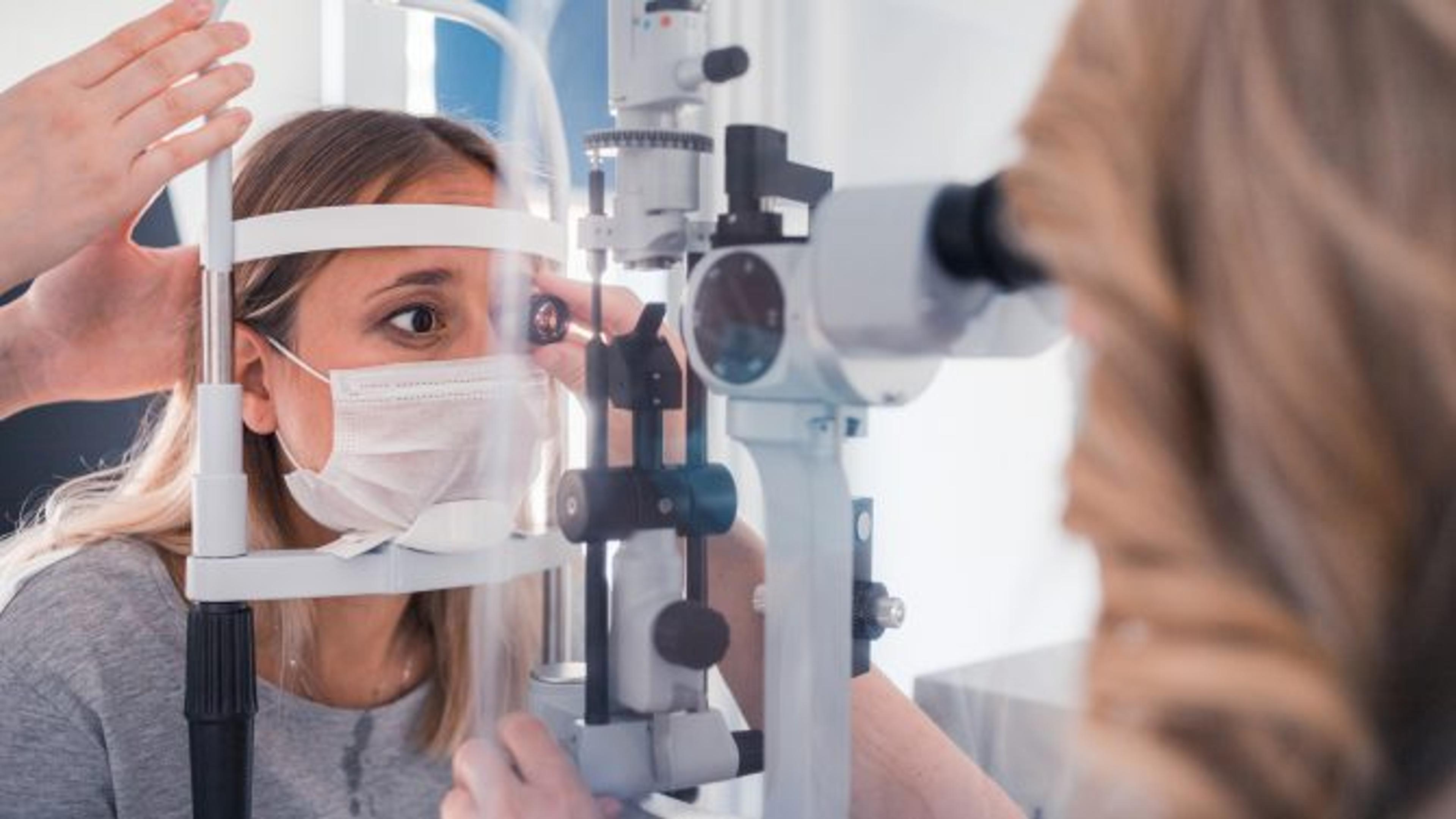 A woman receiving an eye exam