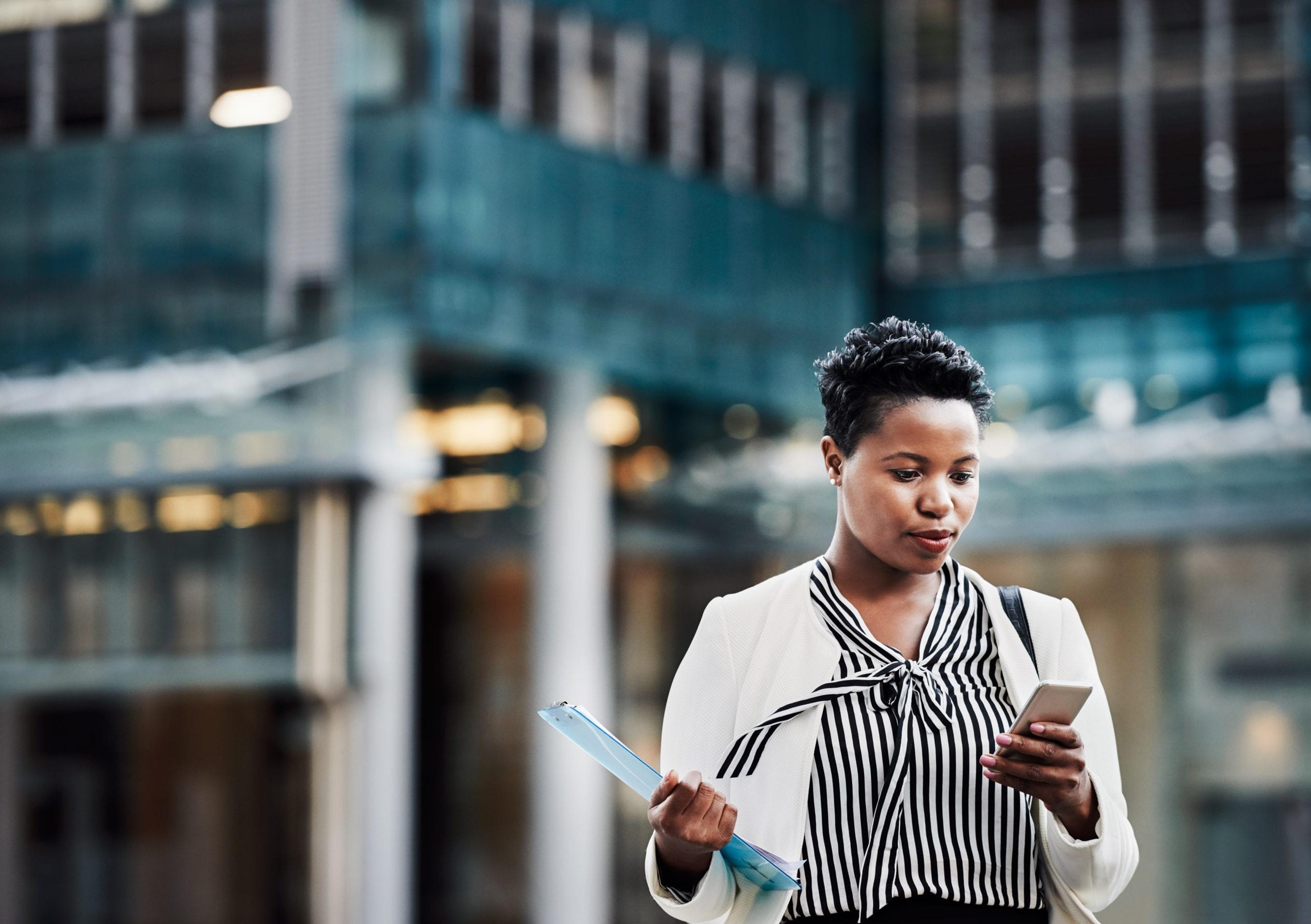 Young woman looking at her phone.