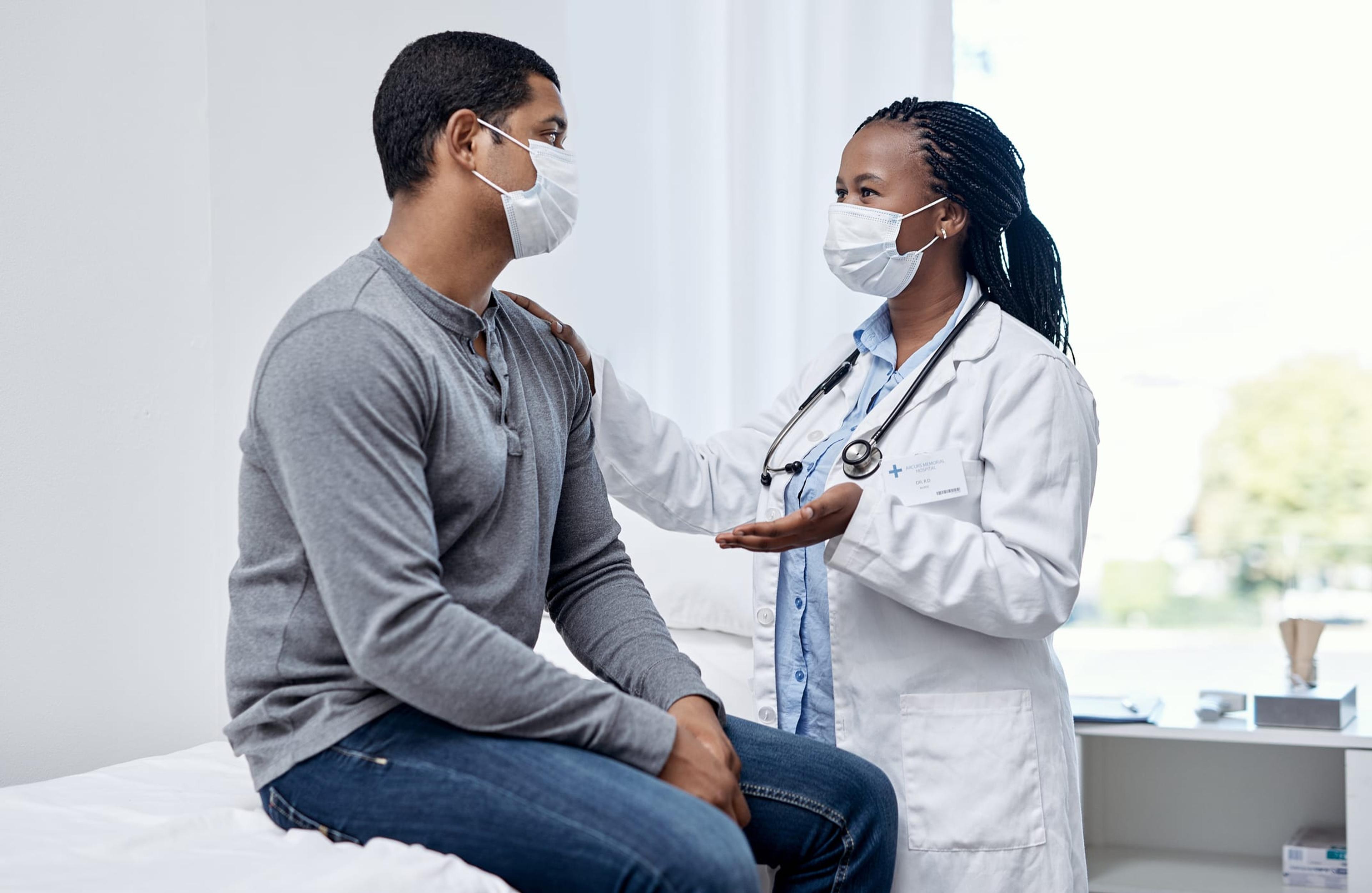 Man wearing a mask decides to see a doctor