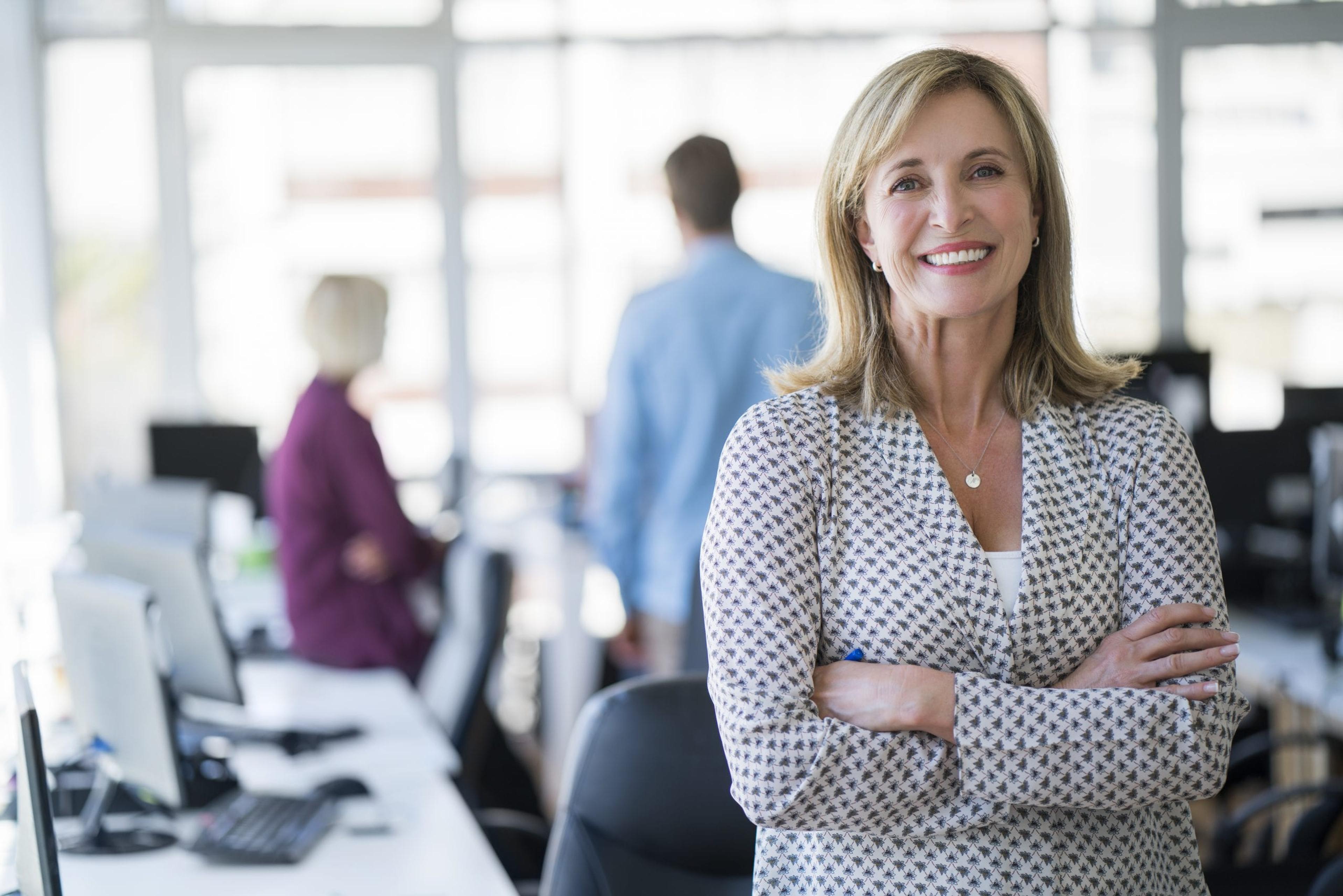 Businesswoman standing confidently in the office.