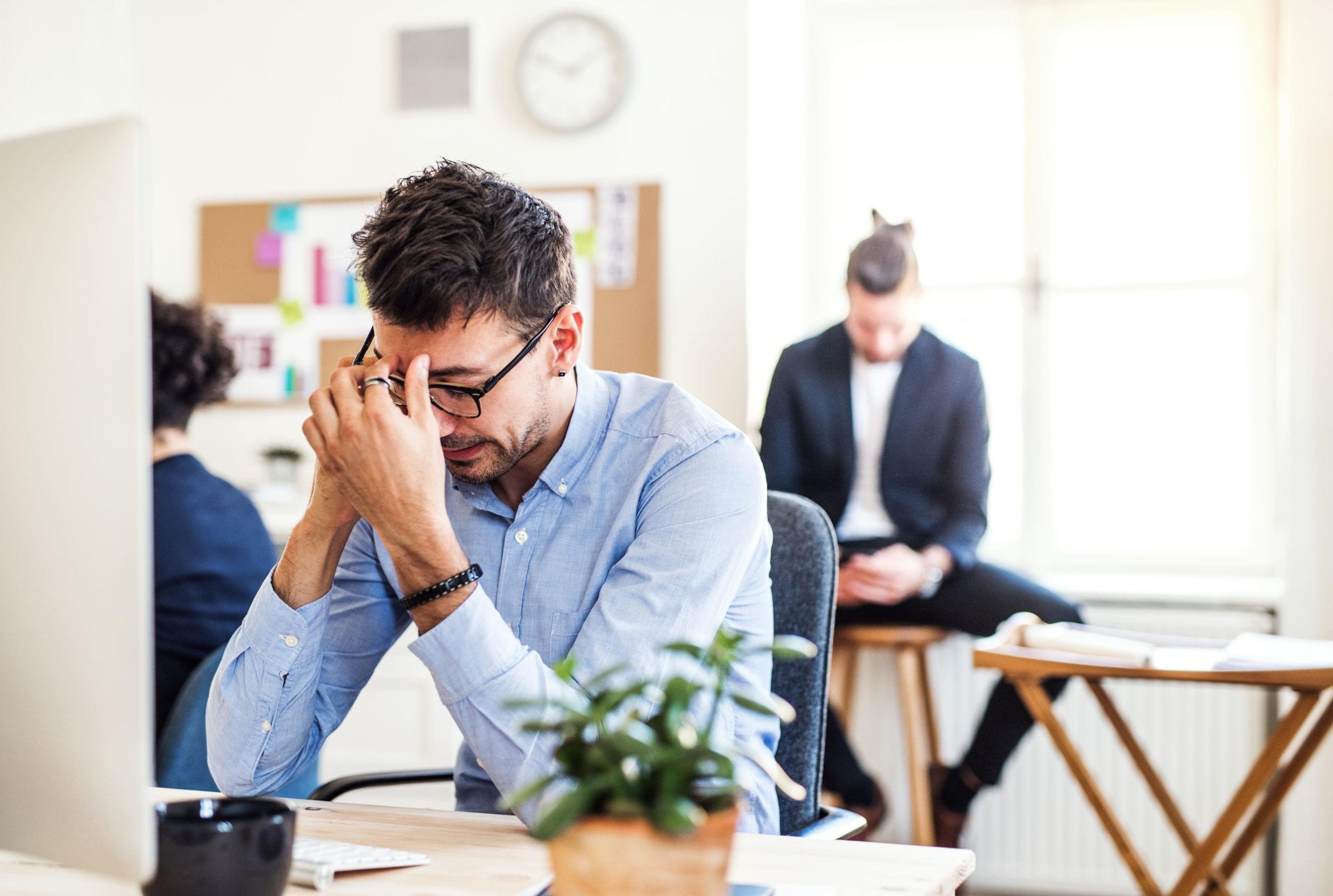 Man stressed at work