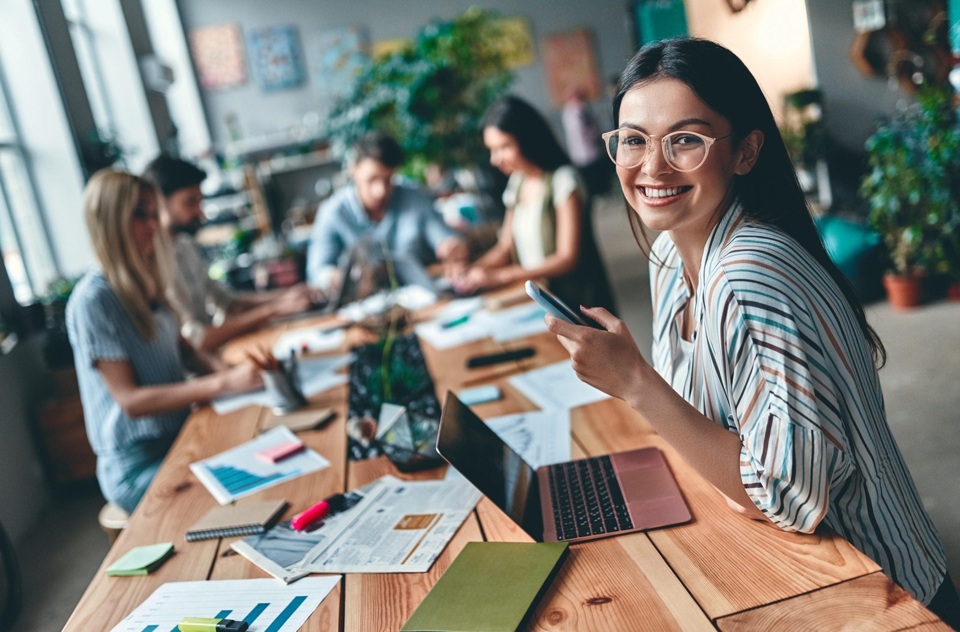 Woman smiling at work.