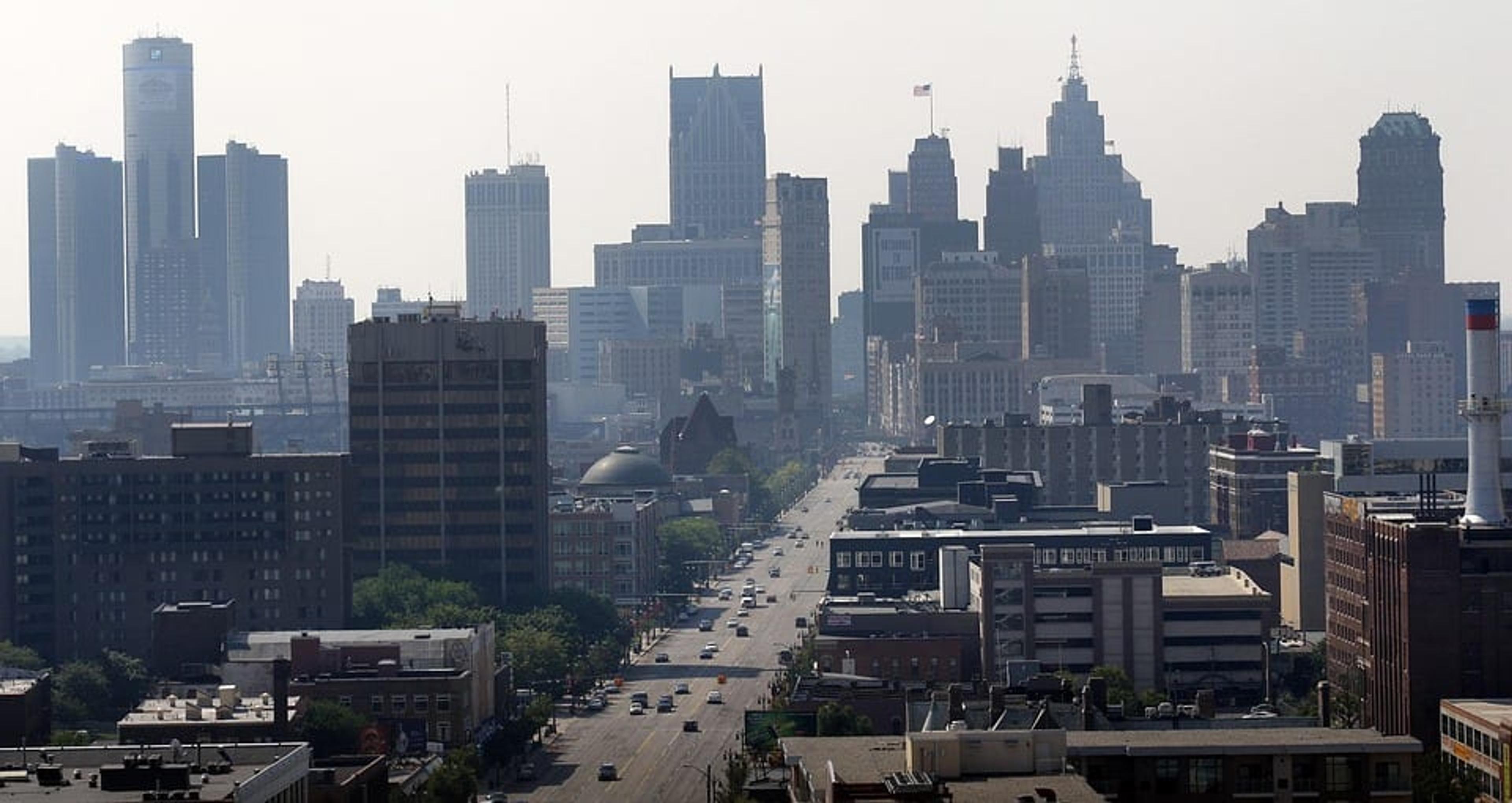 wide view of Detroit with sky scrapers in the background.