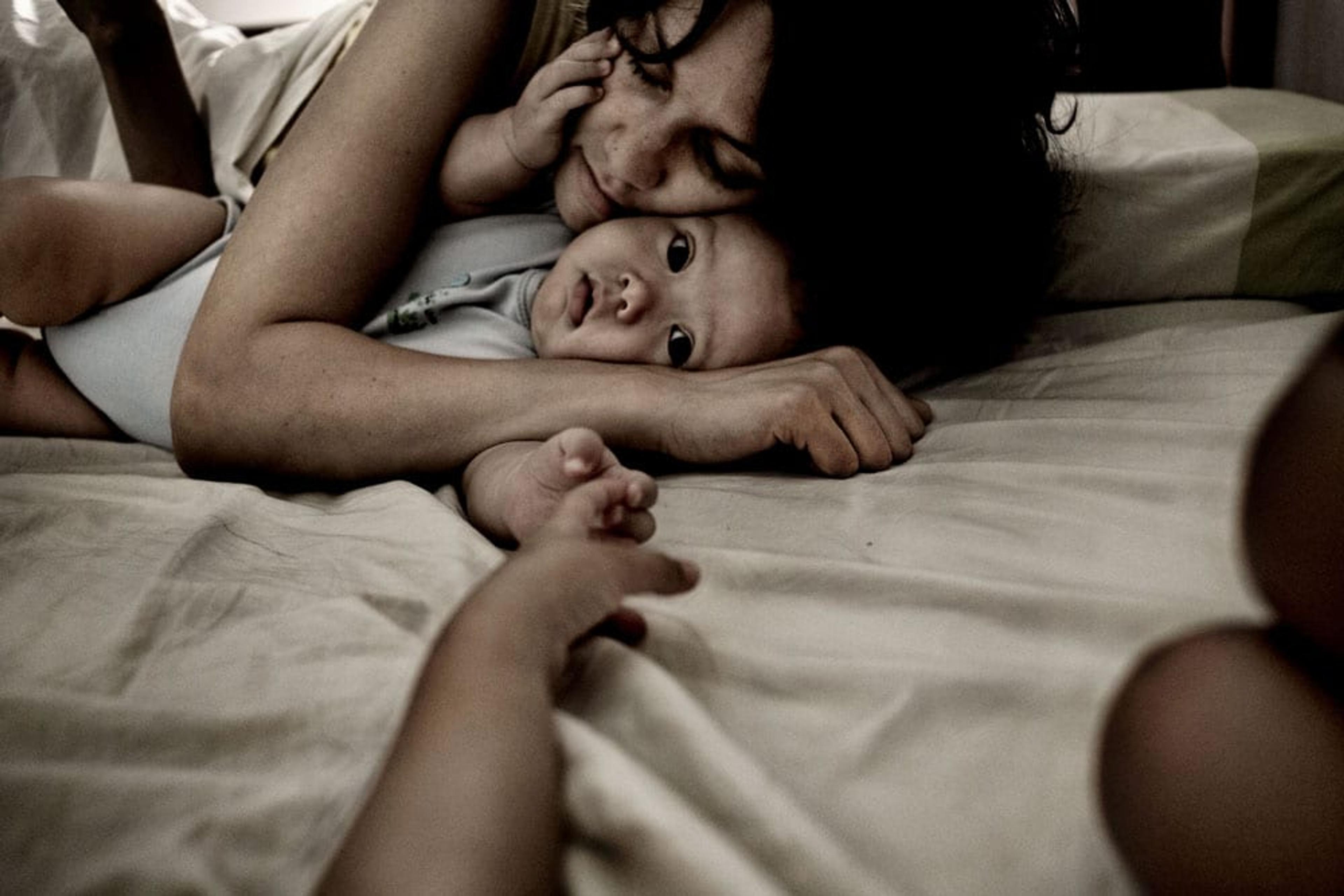 Image of a mom holding her baby.