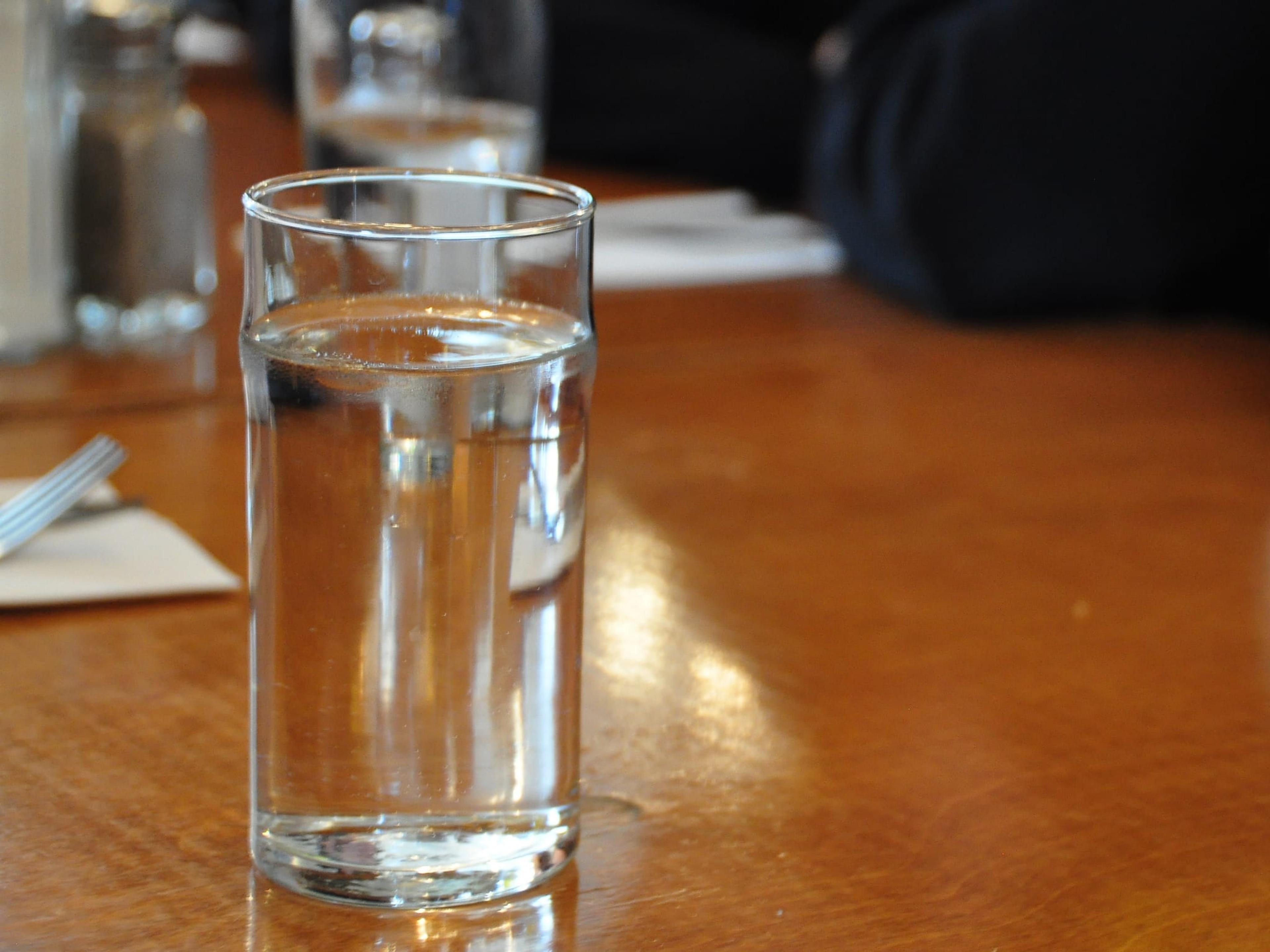 Glasses of drinking water on a table.