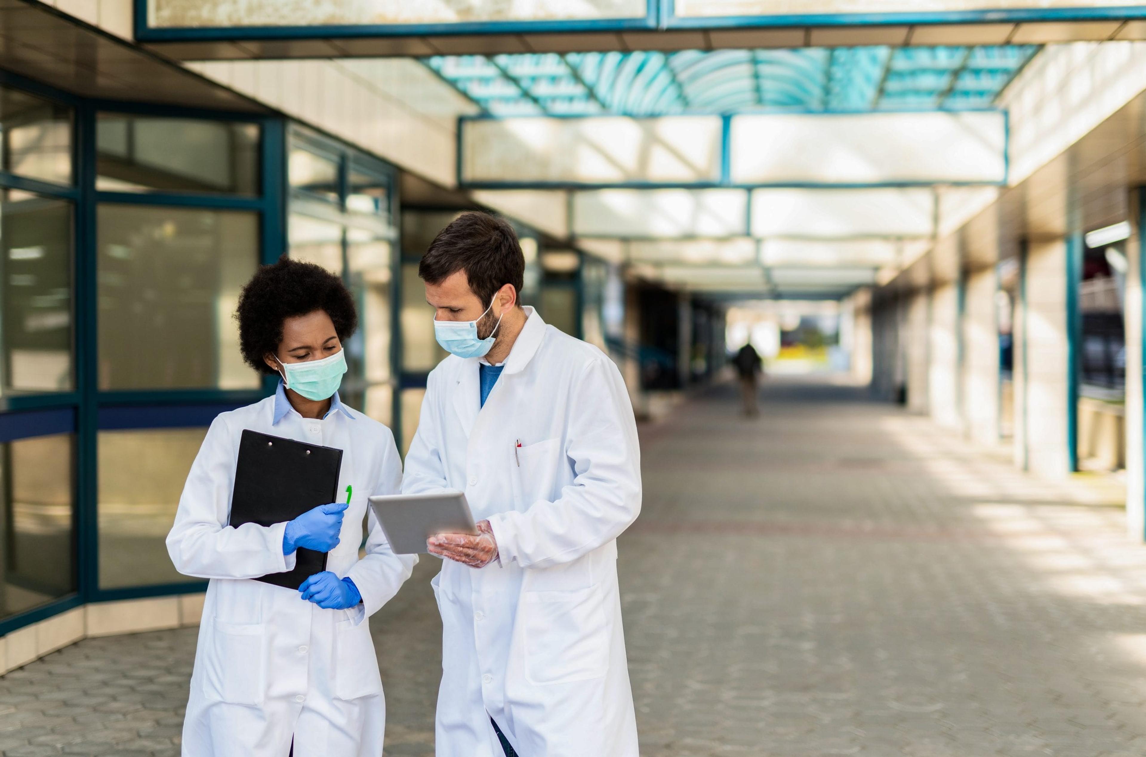 Two doctors looking at results