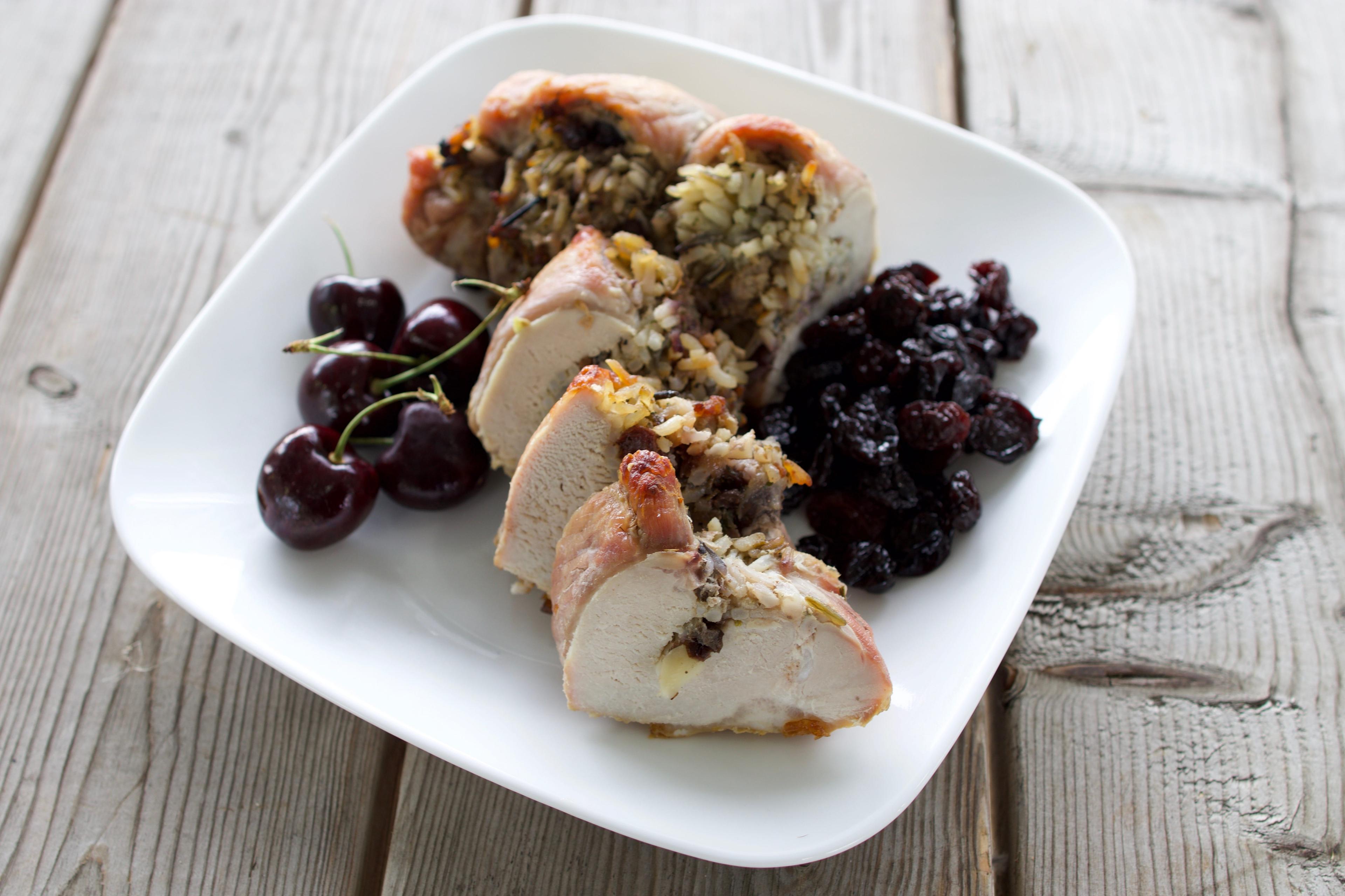 image of a pork loin stuffed with sausage and dried cherries