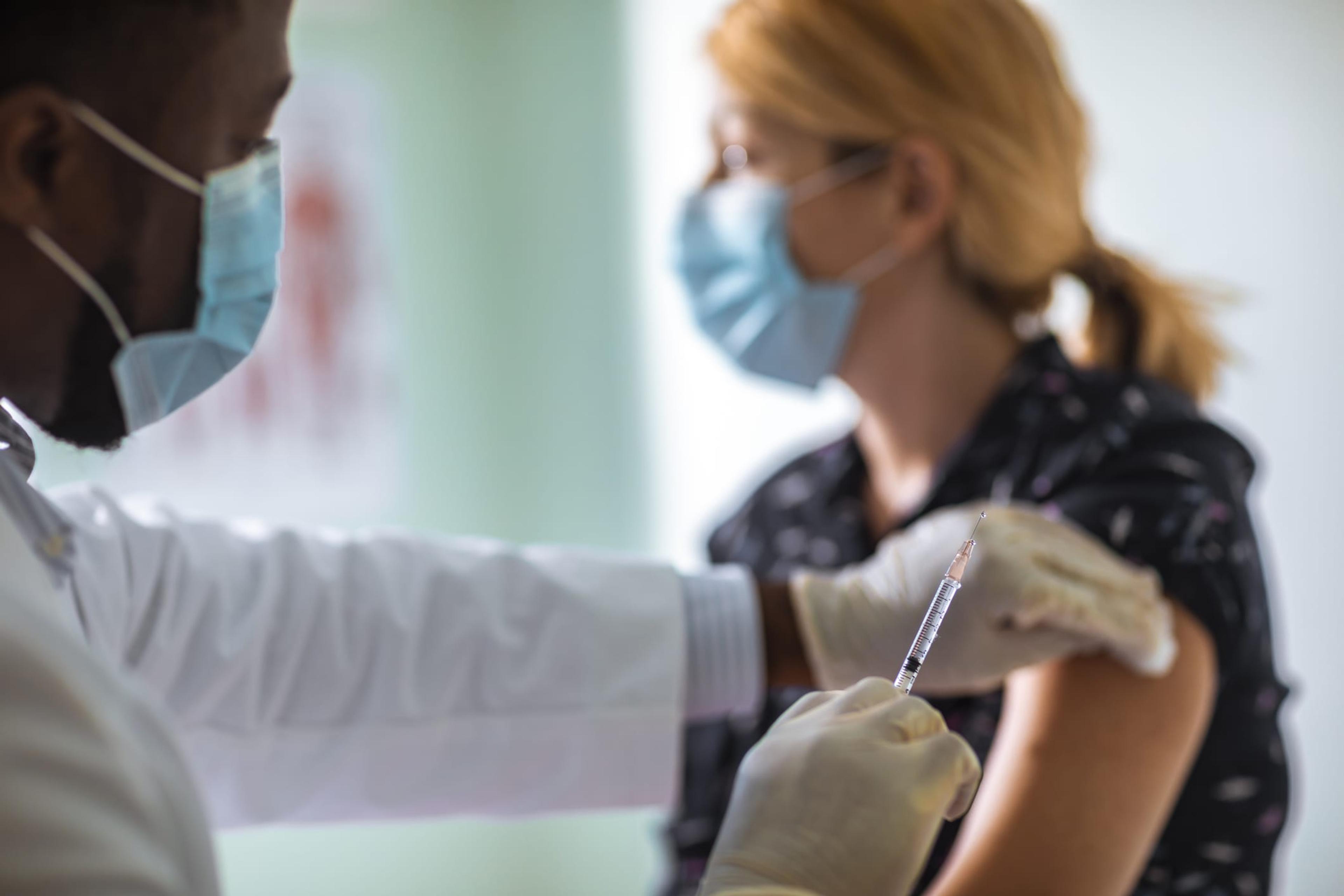 Woman getting flu shot