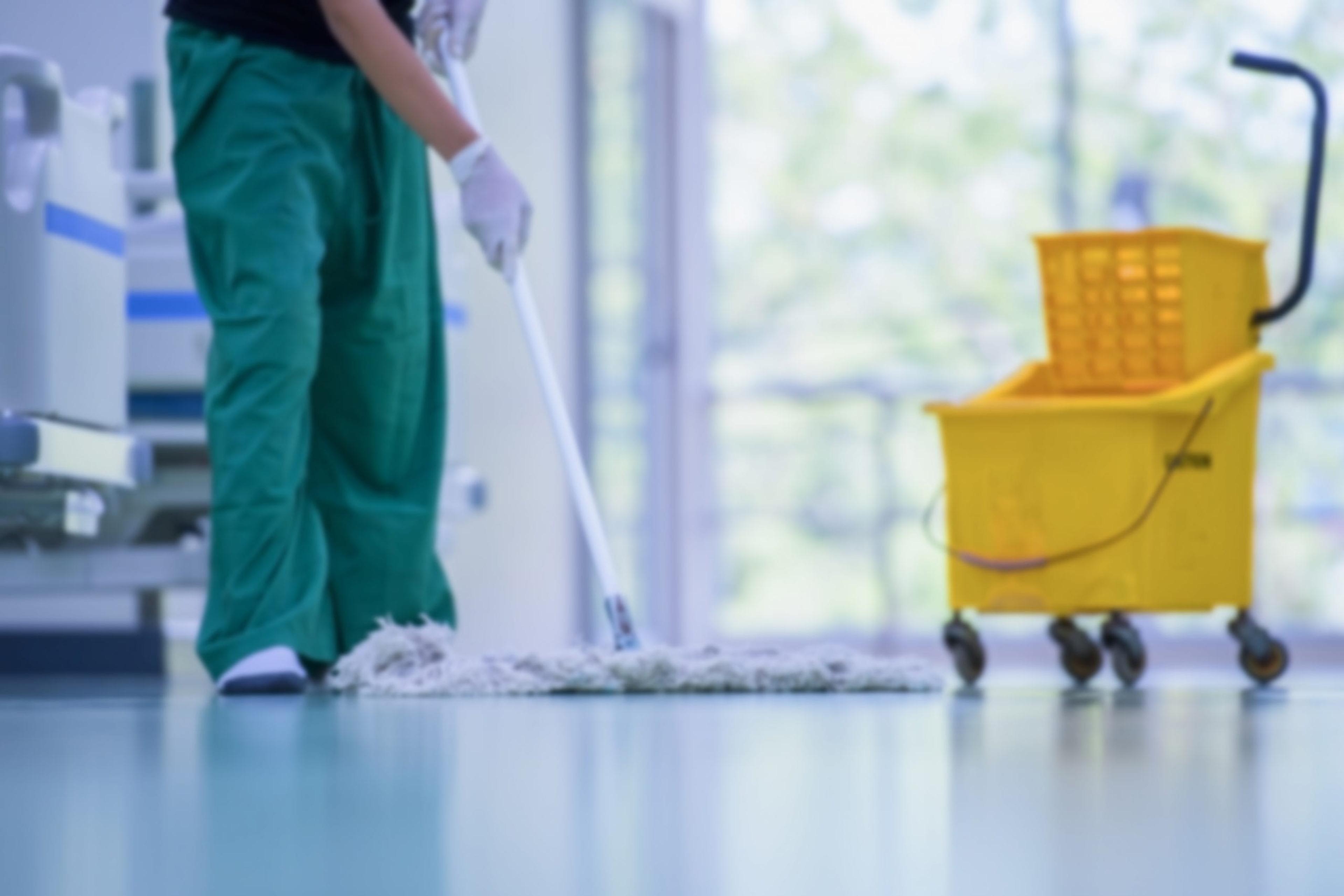 Hospital hallway being mopped