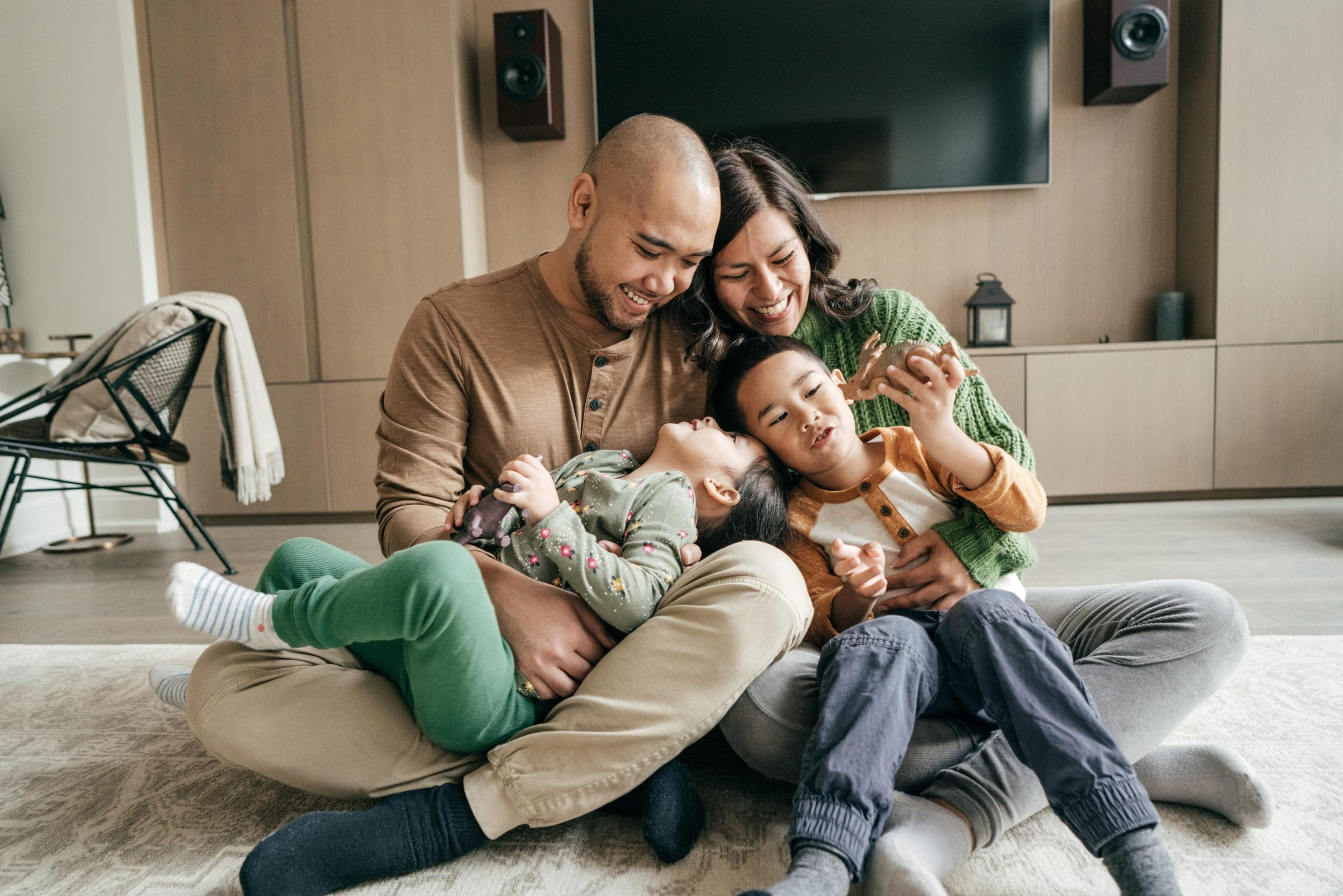 Family sitting and laughing.