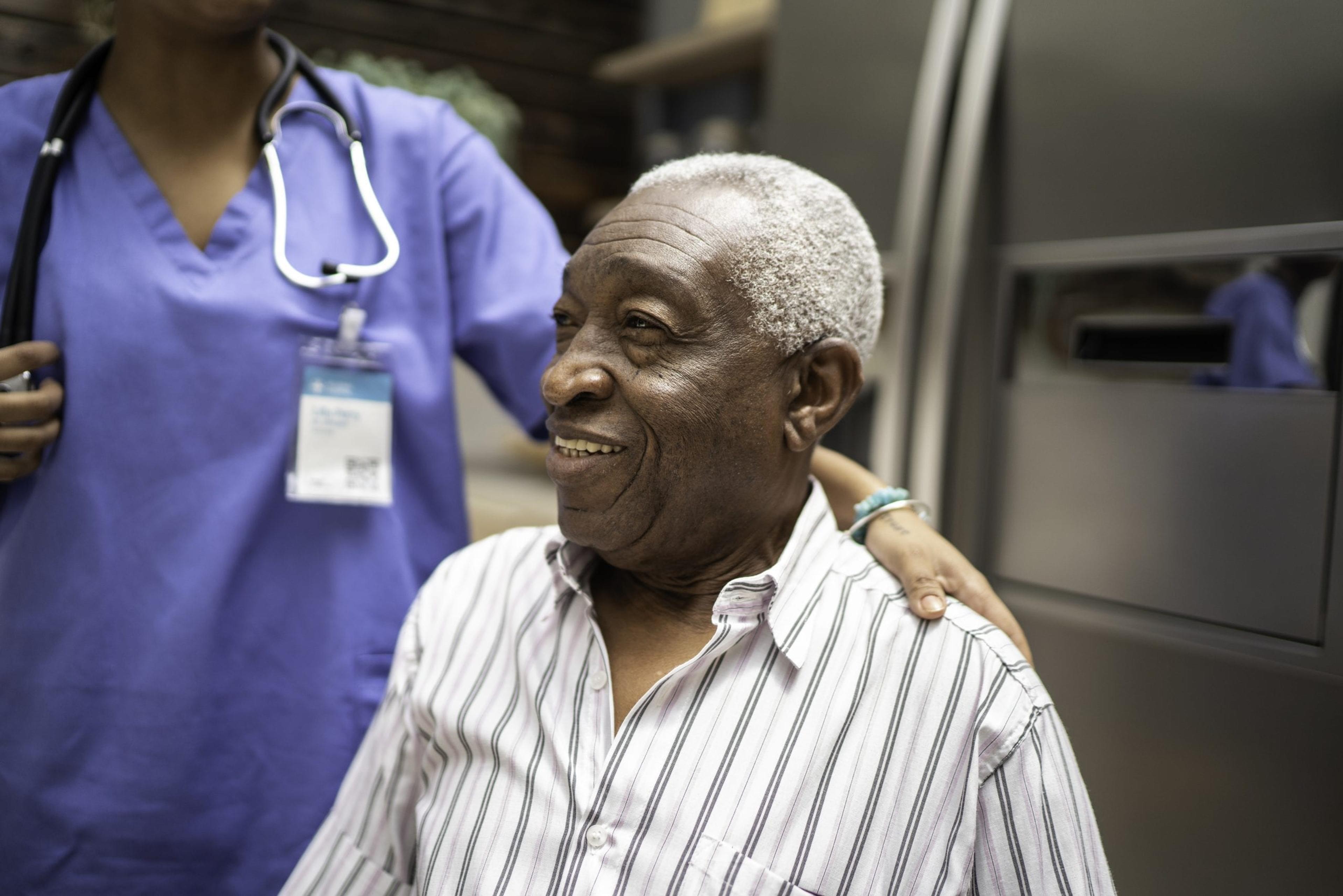 Nurse helping elderly patient