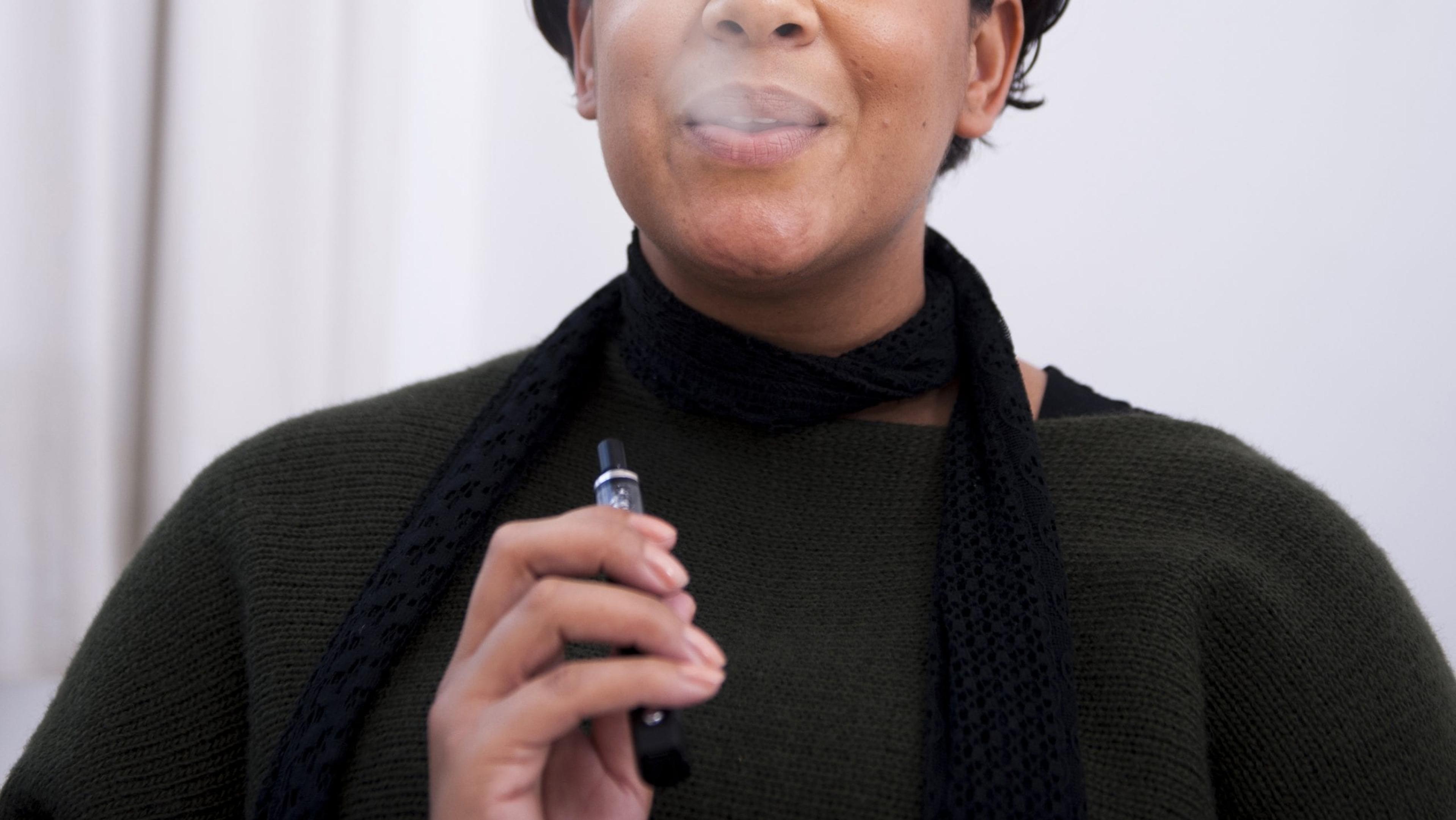 Close Up of Black Woman Vaping