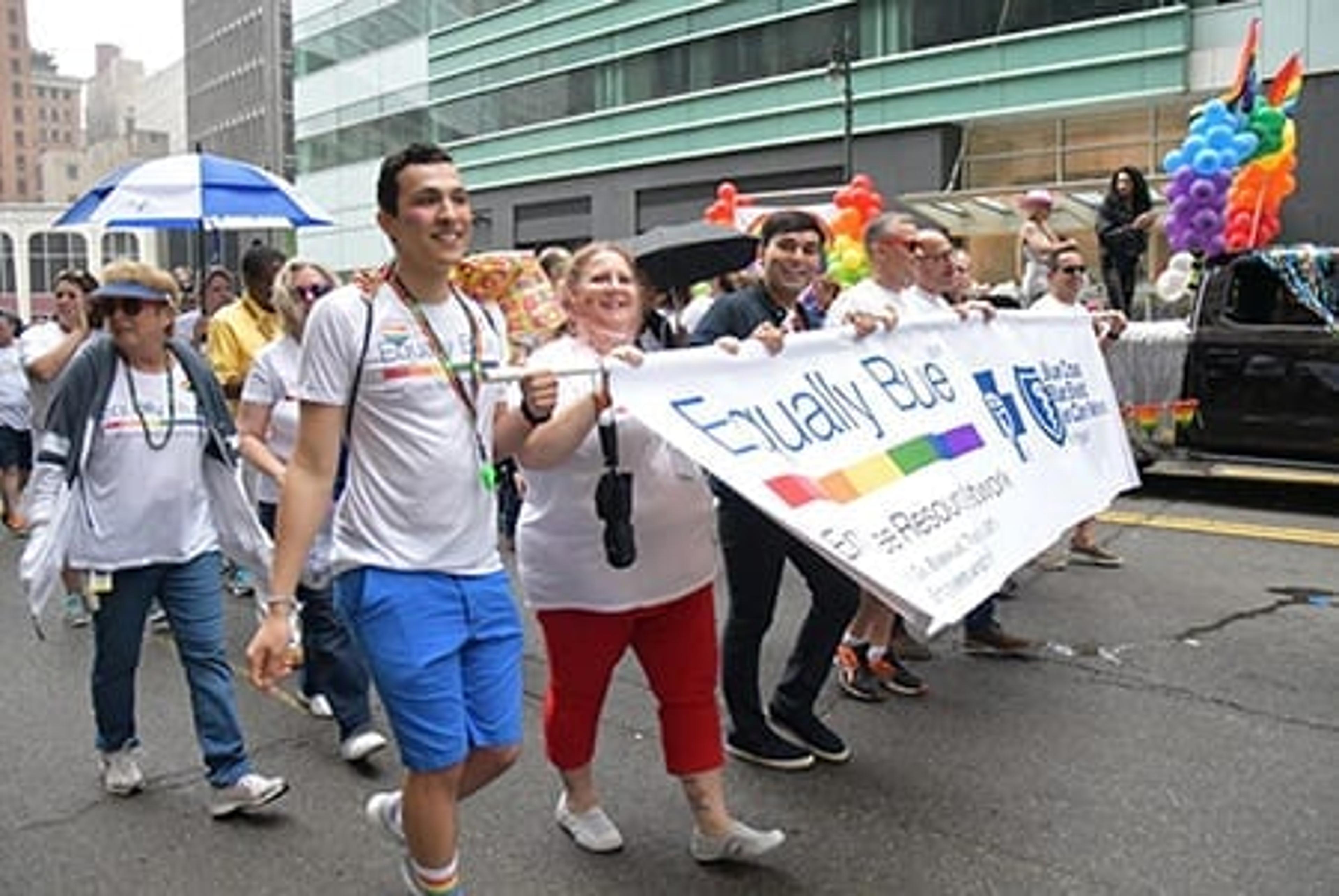 Equally Blue ERN members and their supporters march at the 2018 Motor City Pride event.