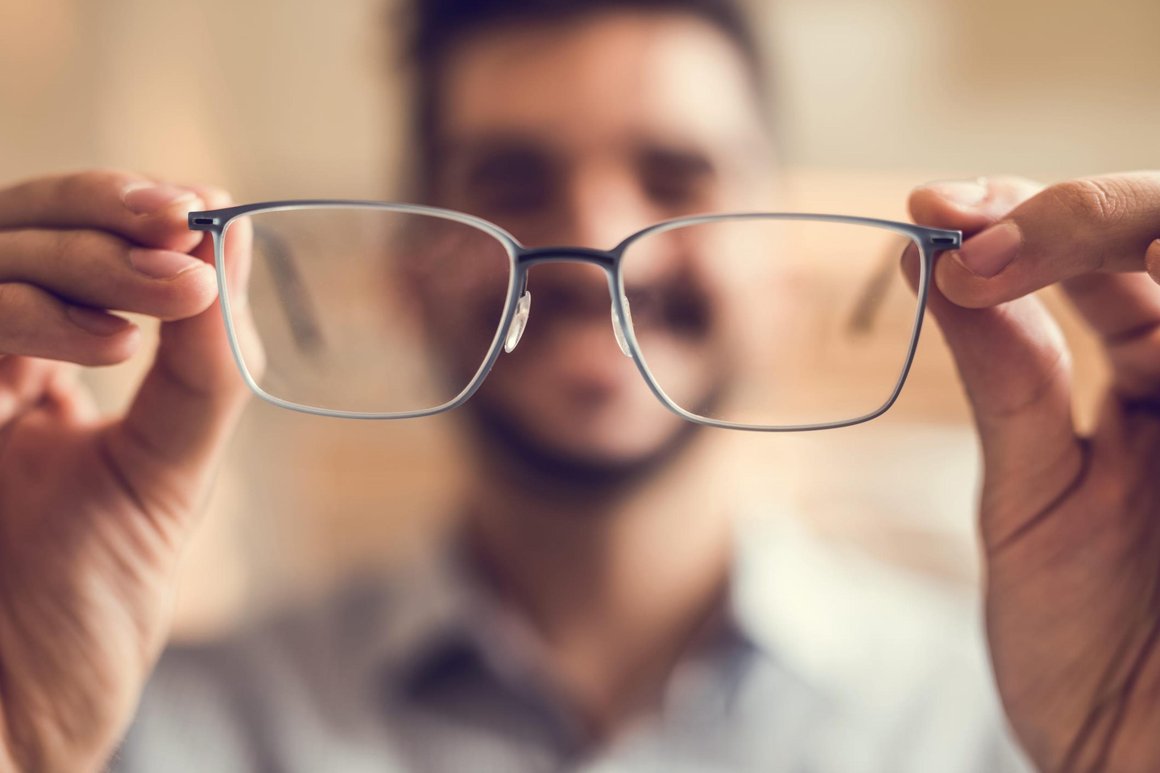 Man holding glasses