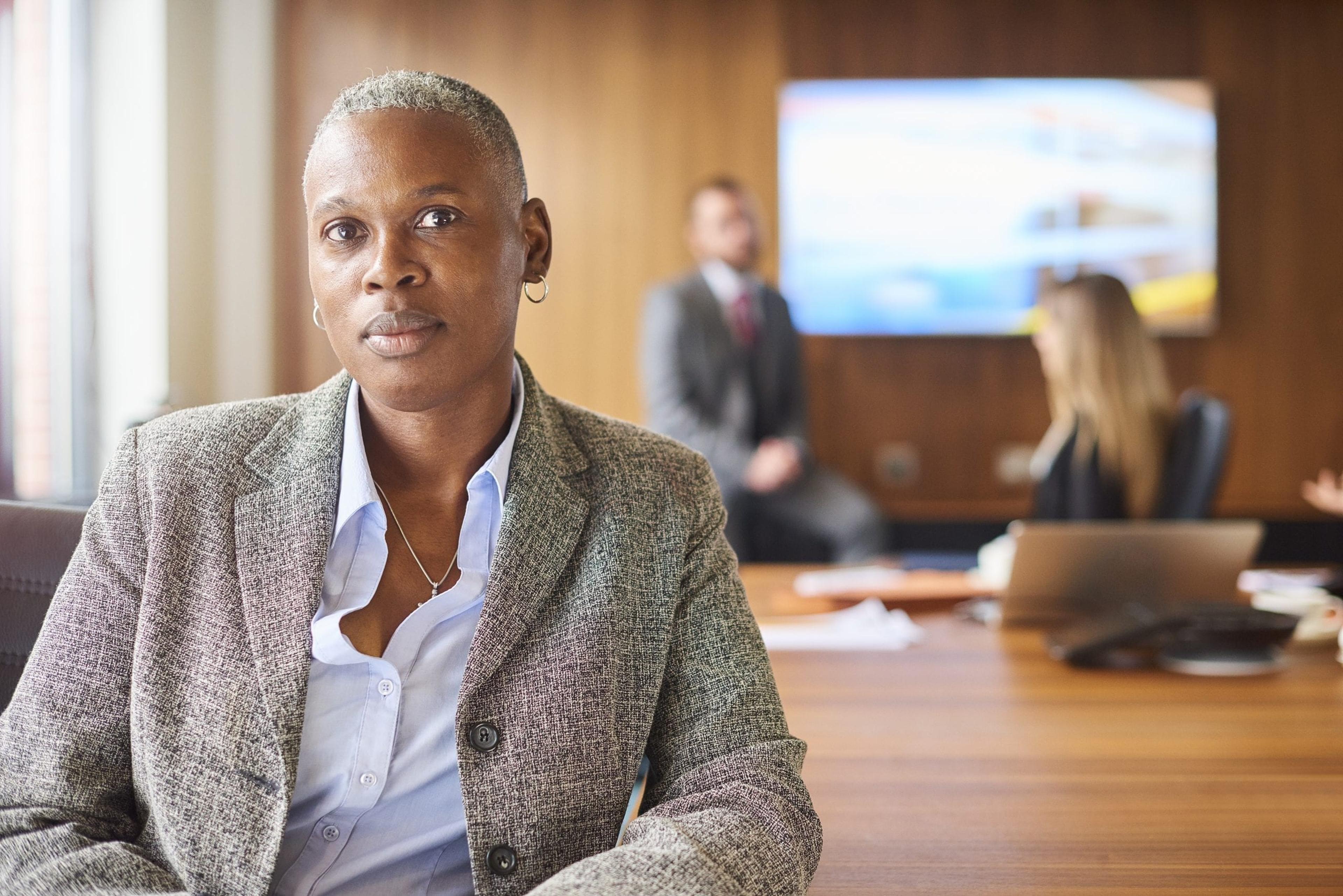 Business woman looking at camera