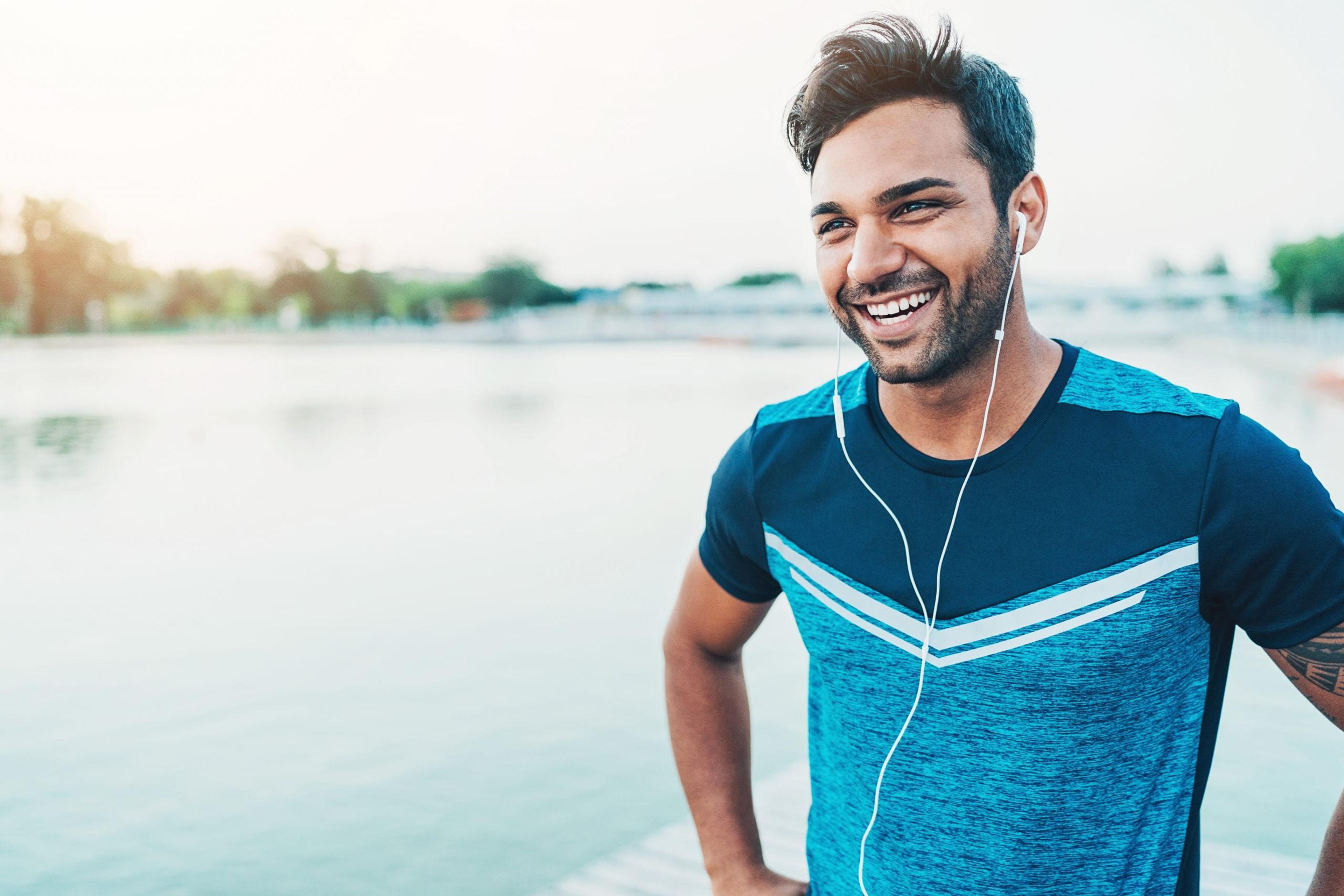 Image of a man smiling after a workout.