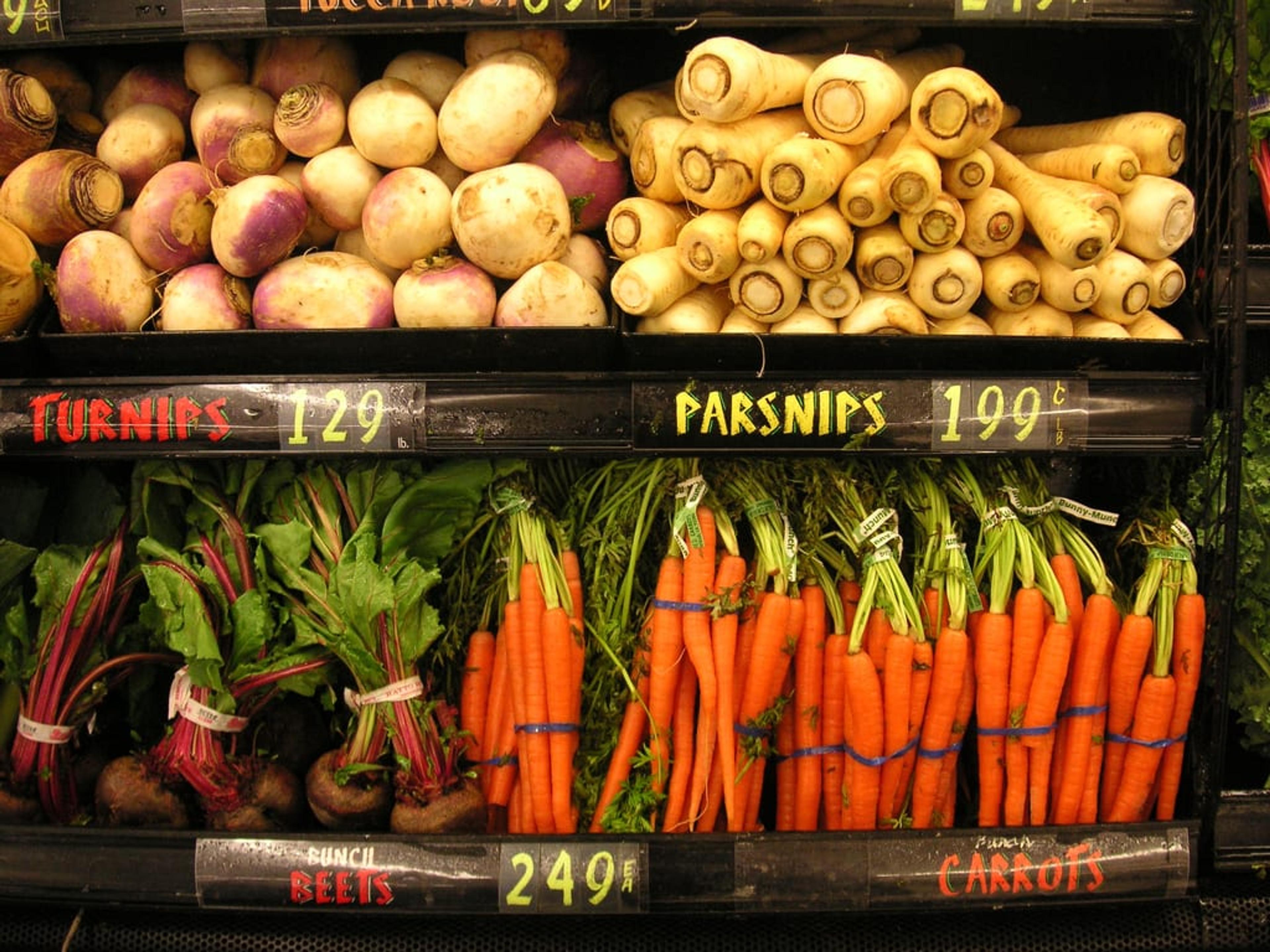 image of root vegetables in a grocery store
