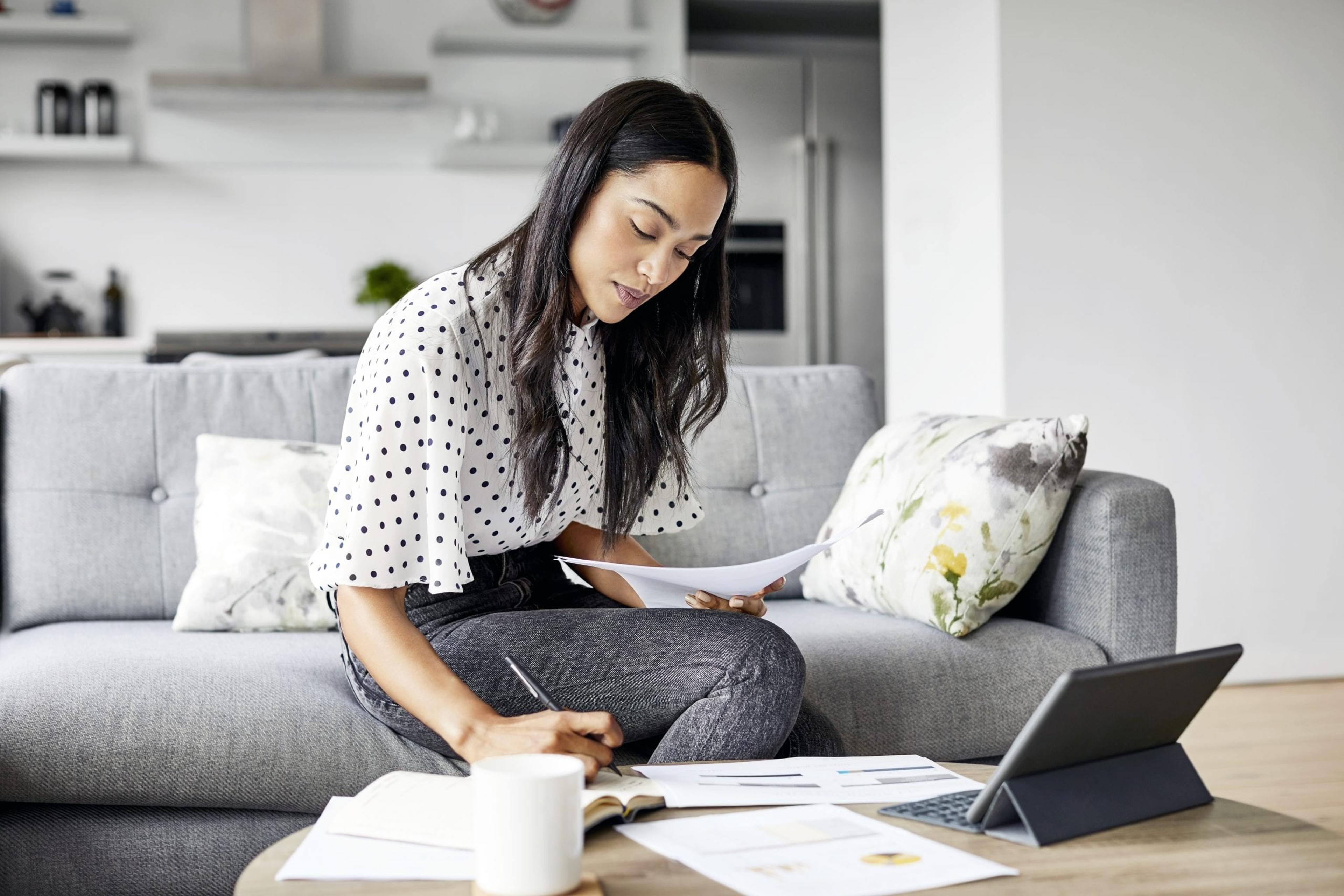 Woman looking at her laptop