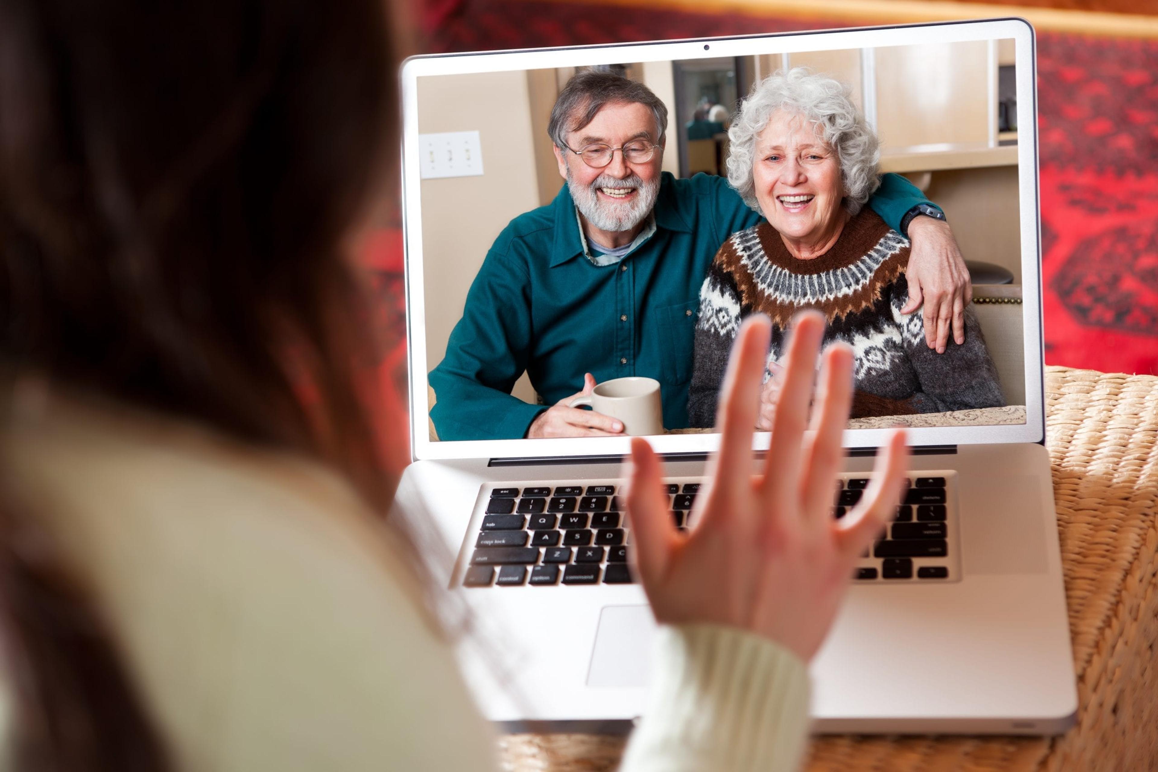 Woman video chatting with her parents