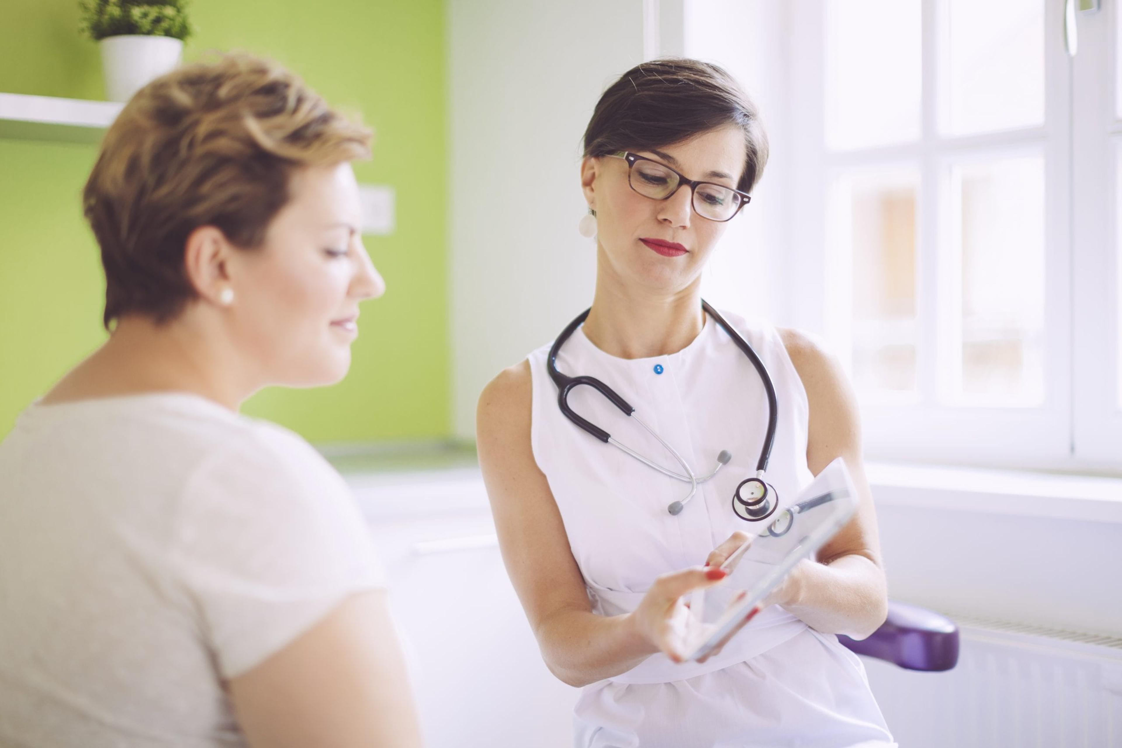 Patient talking with doctor