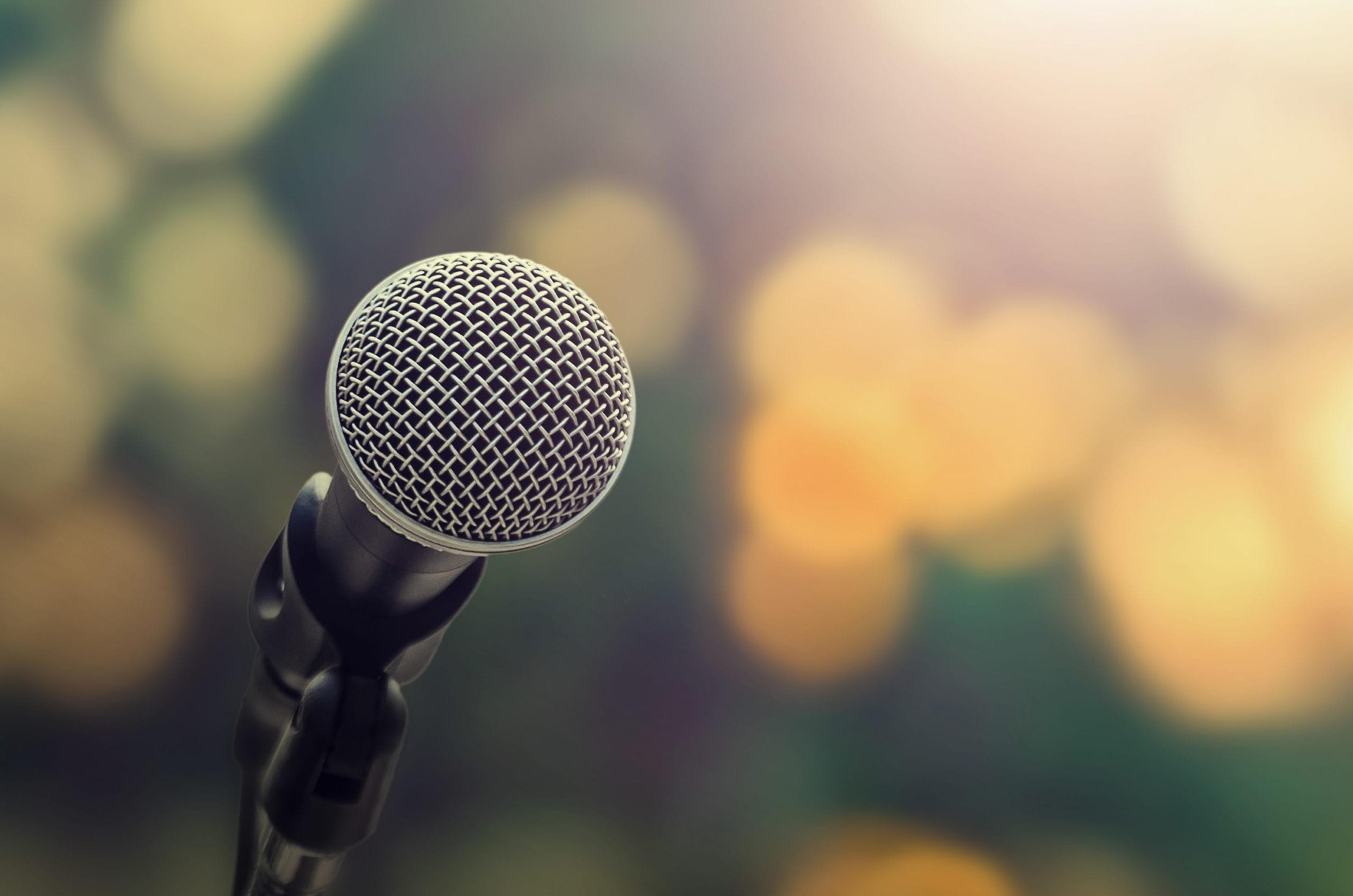 Microphone on abstract background.